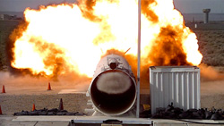 Photograph of end view of blast tube in action.