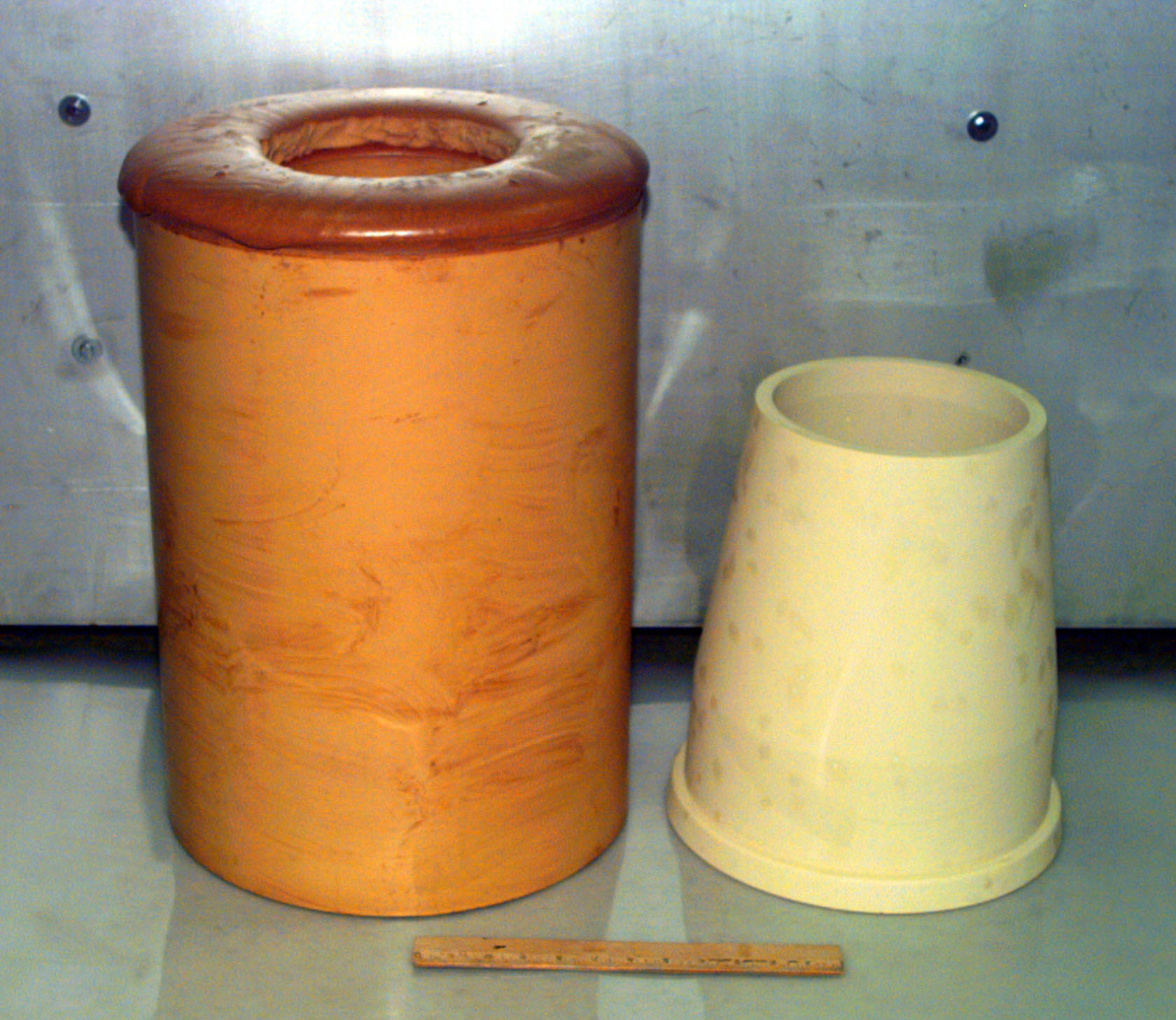 20 kg pour of TEPIC and machined structural part.