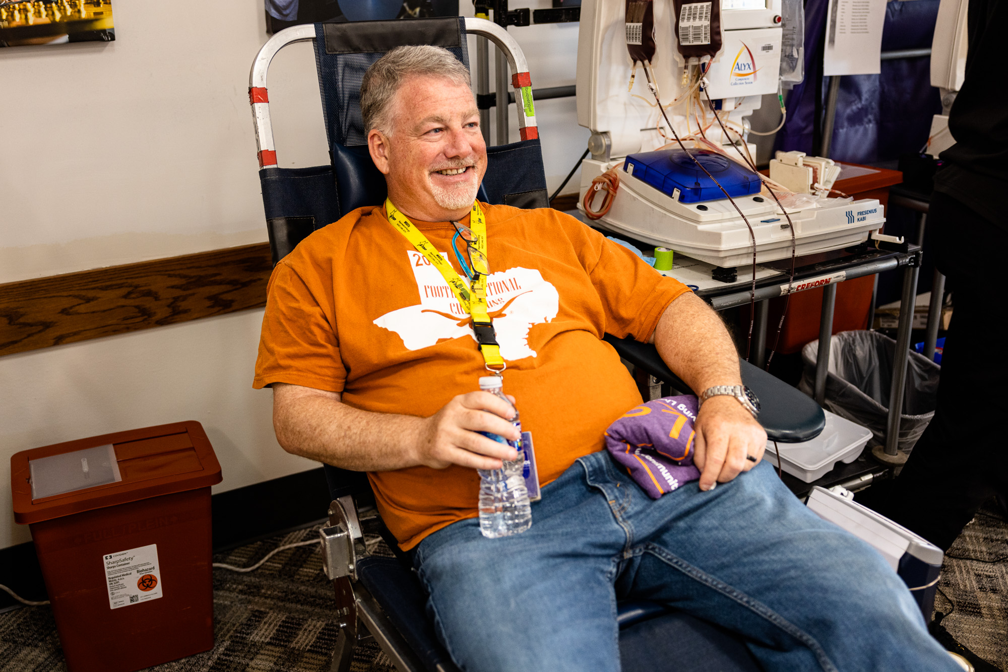 Los Alamos employee John Parchman proudly donating blood at the friendly competition between Los Alamos National Laboratory and Sandia National Laboratories.