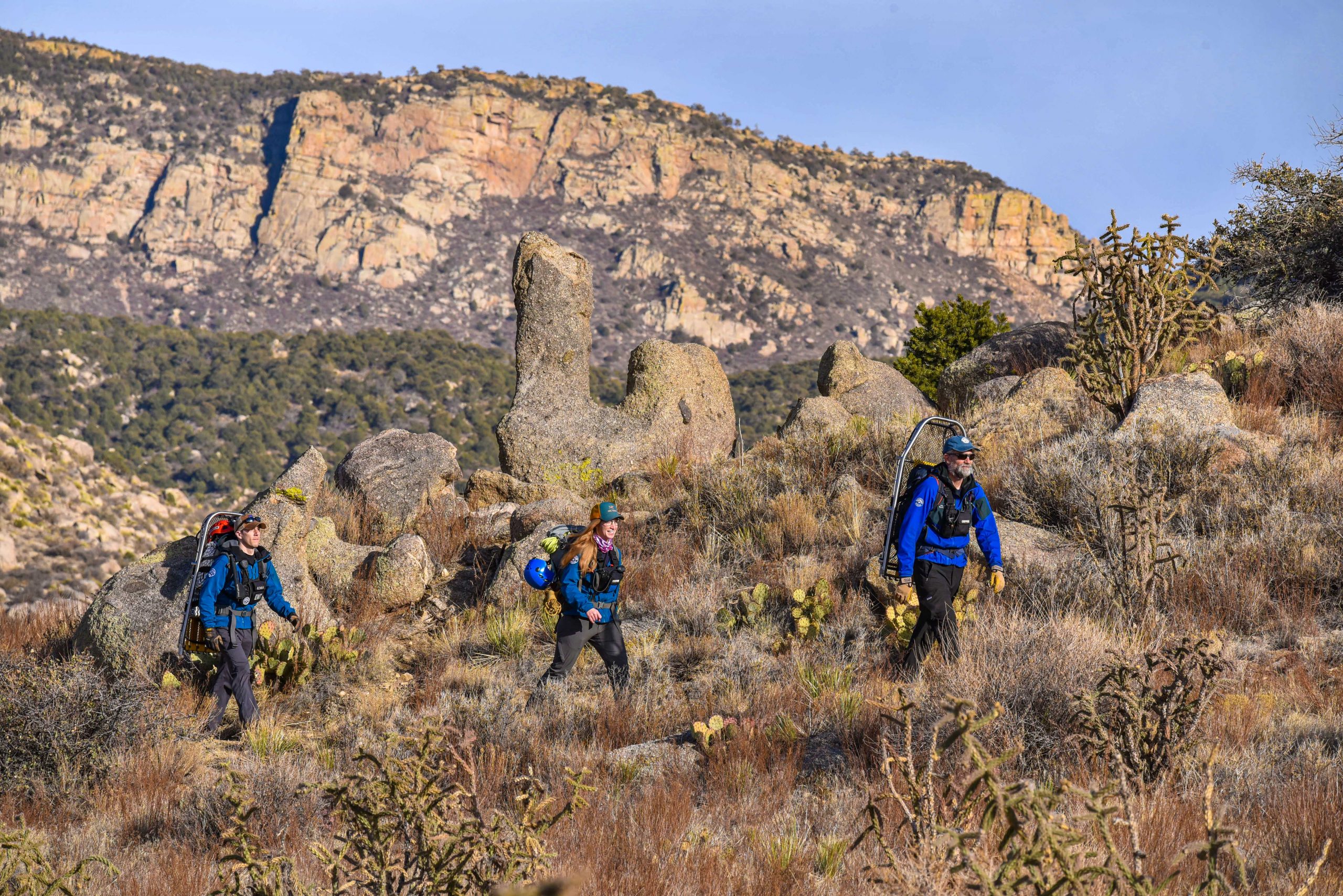 Ruzinsky, Son and Scherzinger volunteer with the Albuquerque Mountain Rescue Council to find lost hikers and rescue injured rock climbers near Albuquerque, and across New Mexico.
