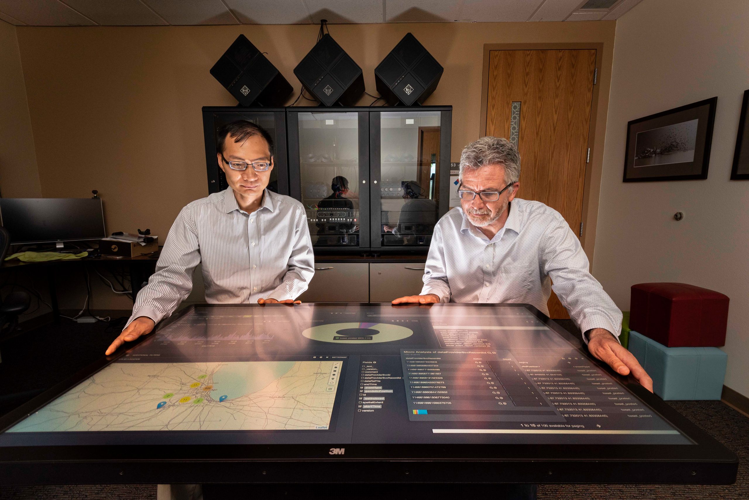 Sandia National Laboratories computer scientists Tian Ma, left, and Rudy Garcia, led a project to deliver actionable information from streaming data in nearly real time.