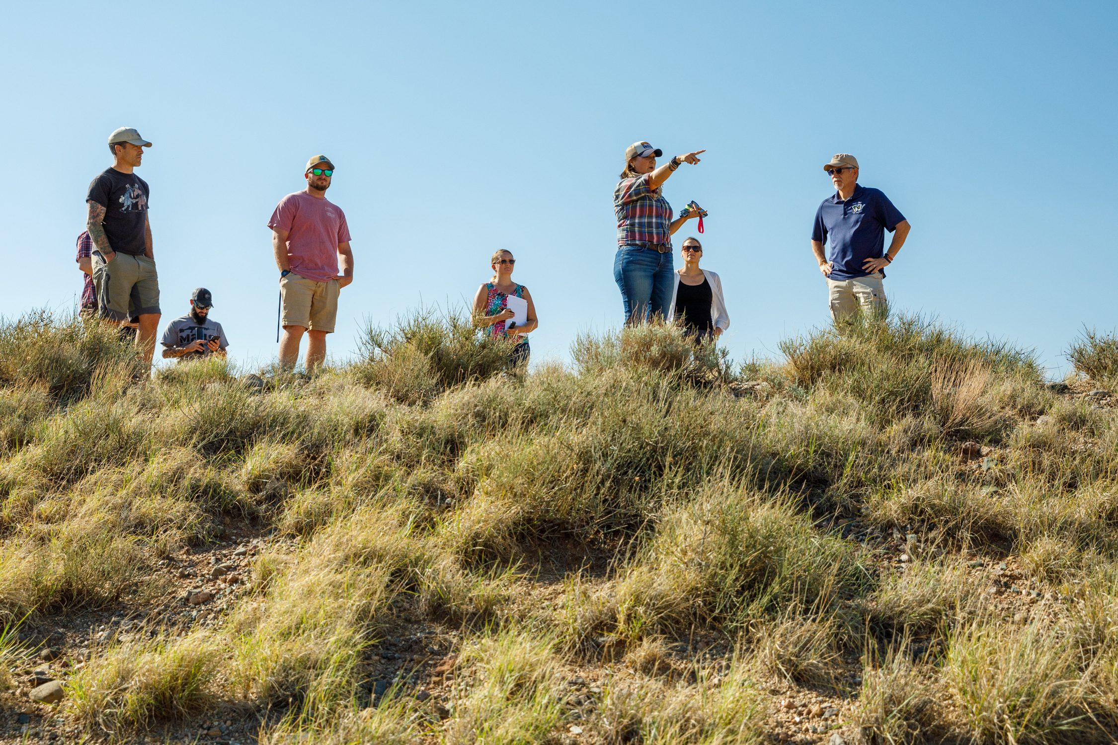 Christina Chavez, third from right, works with teams throughout Sandia National Laboratories to consider effects on historic properties when carrying out or funding projects.