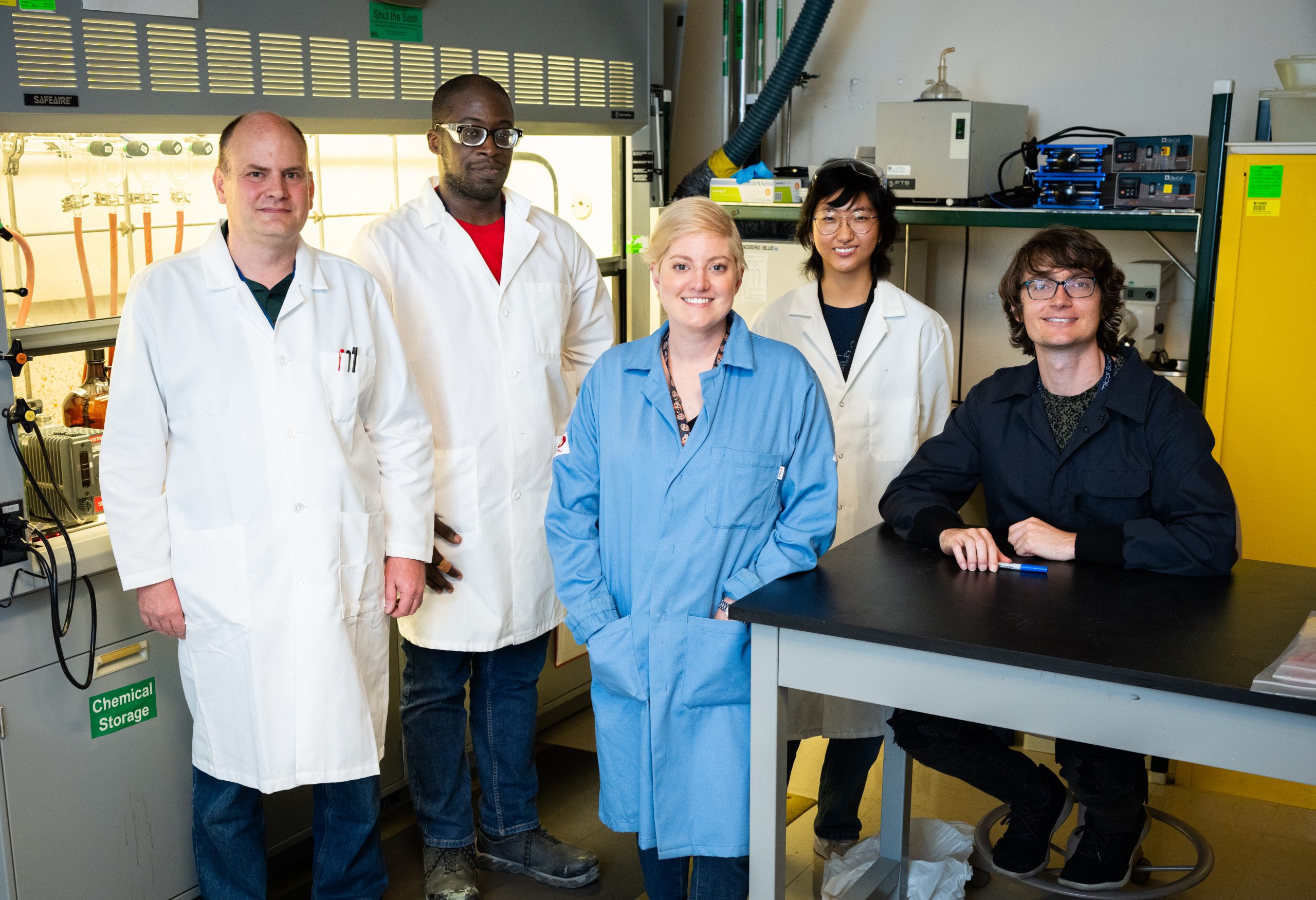 Chad Staiger, Kenneth Lyons, Erica Redline, Alana Yoon and Eric Nagel, left to right, are part of a research team helping make materials more durable at Sandia National Laboratories.