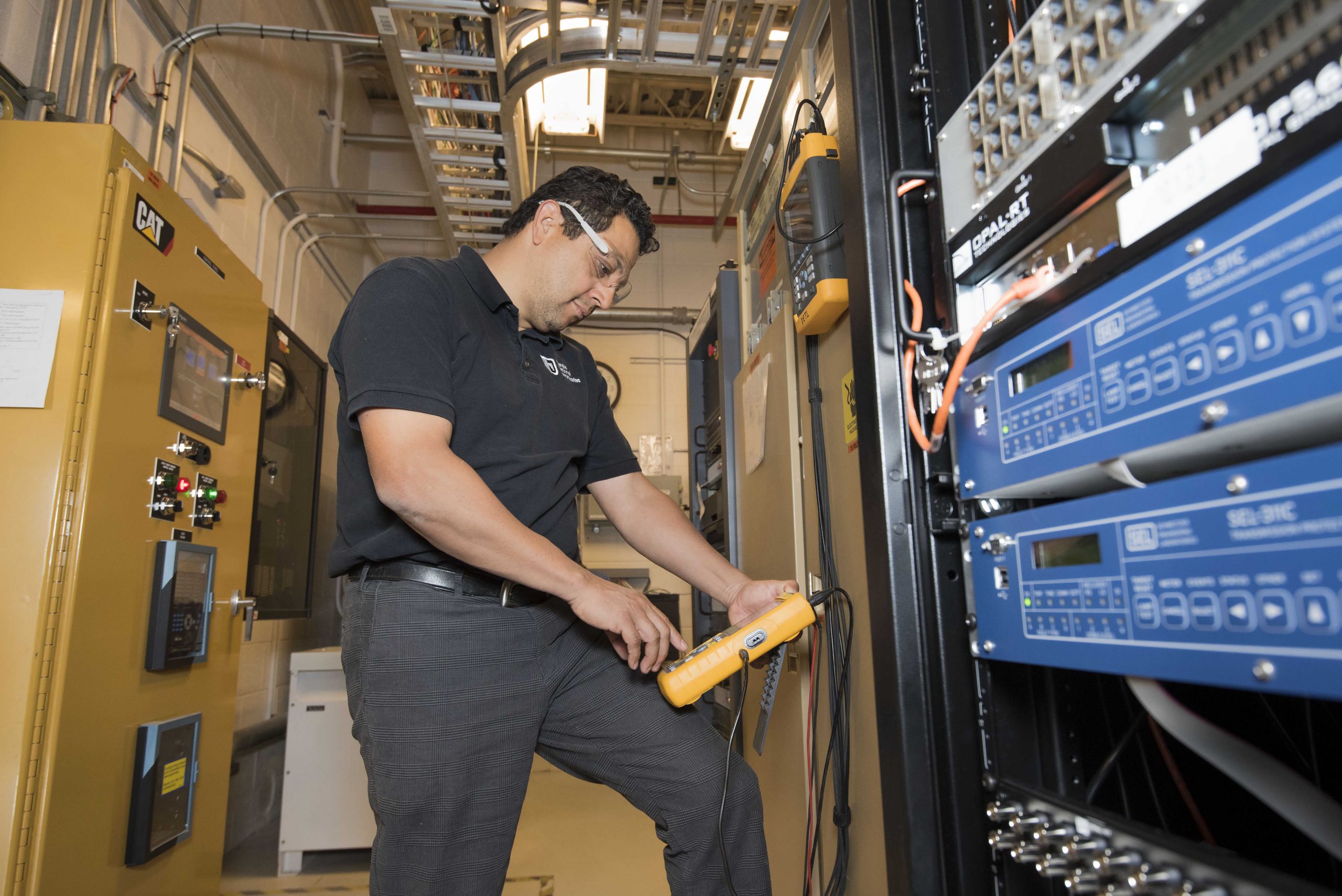 Manager Abraham Ellis works in Sandia National Laboratories’ Distributed Energy Technologies Laboratory. The Cooperative Research and Development Agreement with Emera Technologies Ltd. is part of Sandia's Renewable and Distributed Systems Integration program, which Ellis leads.