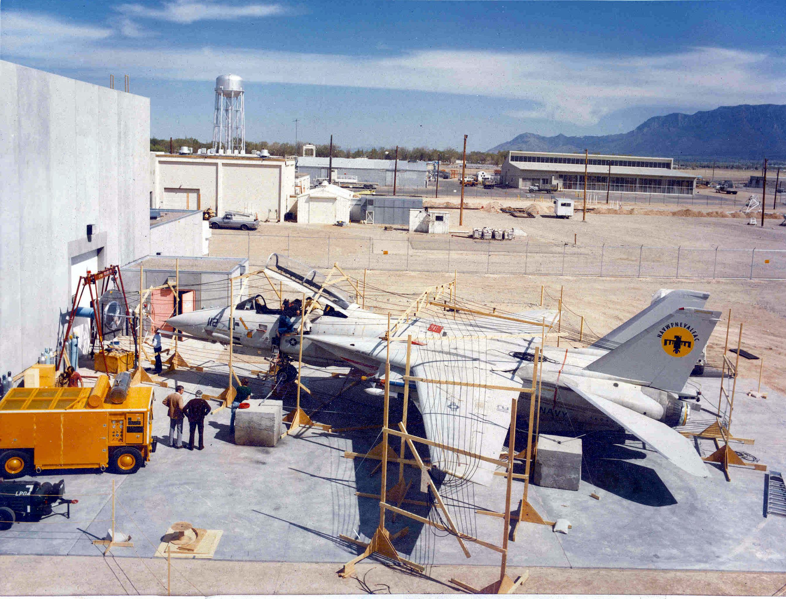 In 1982, Sandia National Laboratories' Lightning Simulator performed a test for the Naval Air Systems Command, which wanted to know how a lightning strike would affect sensitive computer electronics on its aircraft. An F14 was subjected to a charge that entered through the nose and exited via the wing tip.