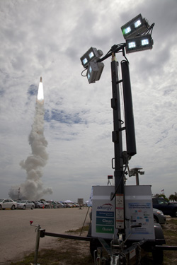 A fuel cell mobile light unit lit the grounds at the final Space Shuttle launch at the Kennedy Space Center in July 2011.