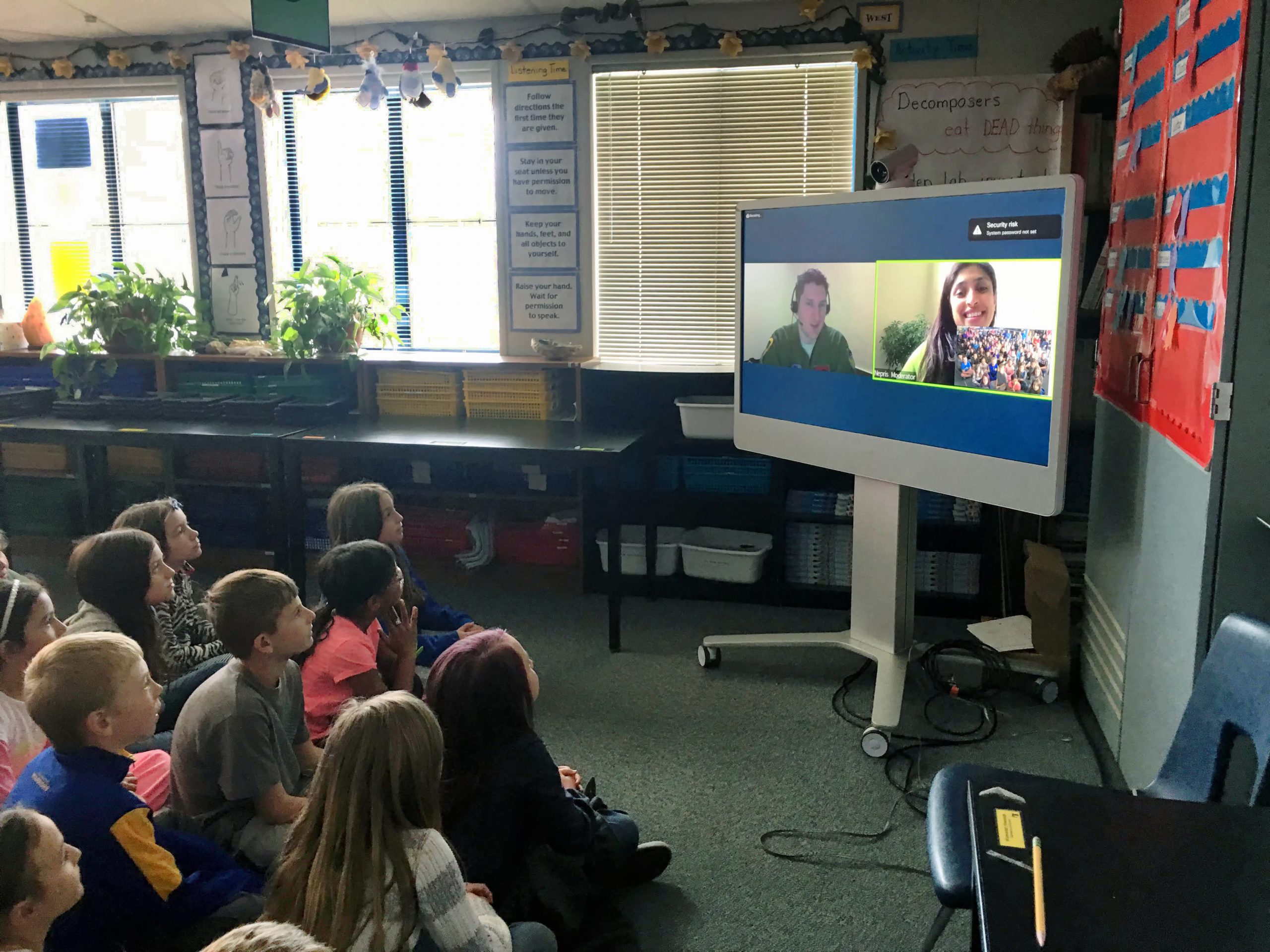 Altamont Creek Elementary School teacher Fenna Gatty’s students in Livermore, California, videoconference with a pilot, left on the screen, and a computer scientist.
