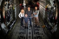 Aboard the 58th Special Operations Wing’s C-130 transport aircraft at Kirtland Air Force Base, Christy Sturgill, Jacob Hazelbaker, Eric Vugrin and Nicholas Troutman, from left to right, were part of the Sandia National Laboratories team working on a moving target defense that makes a computer network commonly used on space and aircraft less vulnerable to cyberattack.