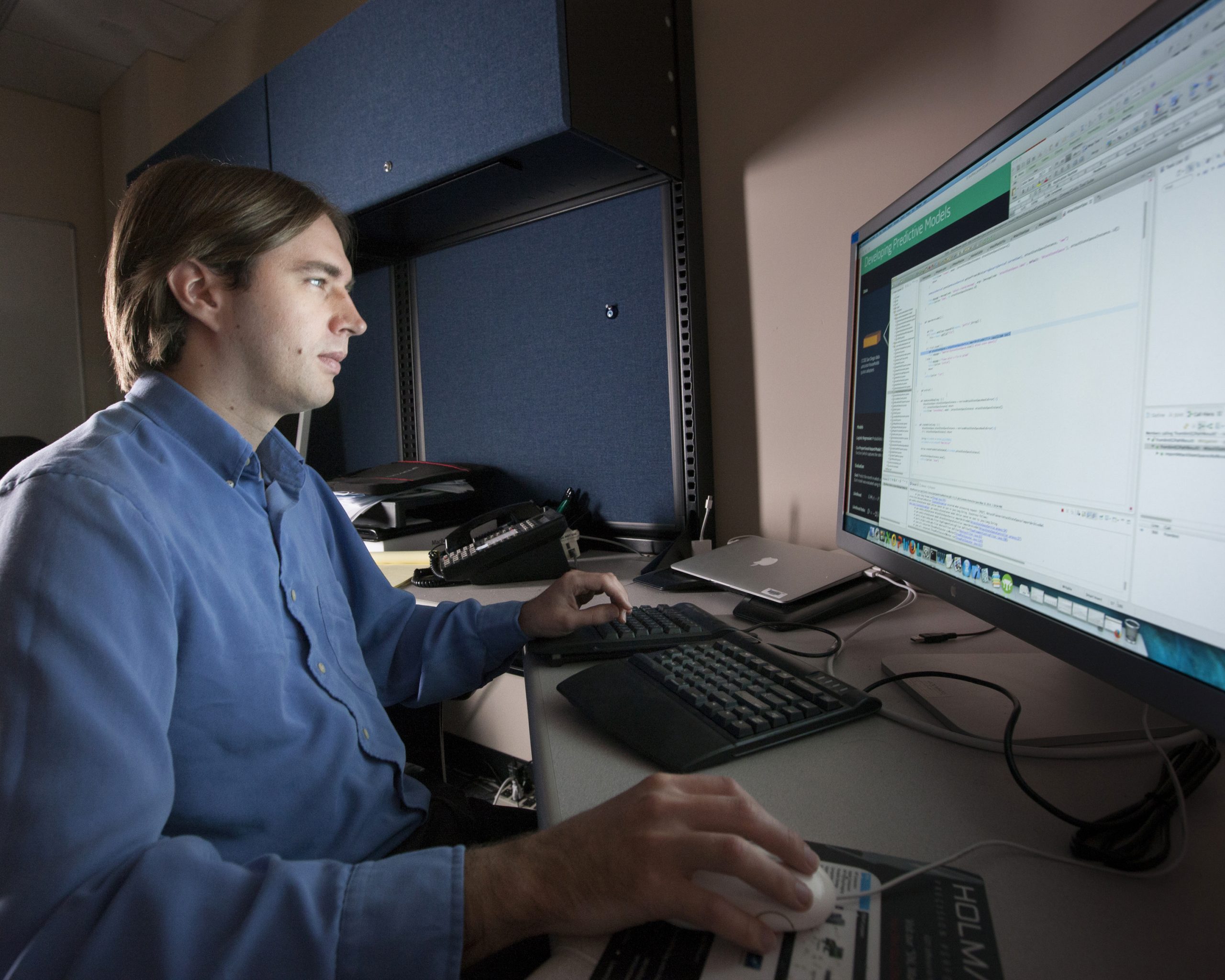 Sandia National Laboratories researcher Joshua Letchford processes survey data gathered from a sampling of both San Diego photovoltaic adopters and those who have not yet adopted in that region. The questions on the surveys were influenced by the results from the initial predictive models and touch on issues such as environmental awareness, energy independence and information about life events.
