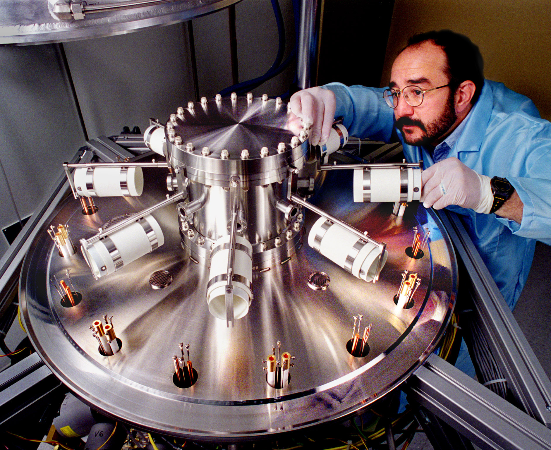 Sandia National Laboratories technologist Michael Lopez worked in 1996 on the first generation of a Sandia-built neutron tube exhaust-bake station. The American Vacuum Society recognized Lopez in 2016 for his exceptional technical support of thin film research and development.
