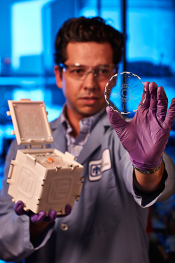 Sandia’s SpinDx device features centrifugal microfluidics, or “lab-on-a-disk” technology, which uses centrifugal forces to manipulate samples and reagents through microfluidic channels implanted on disks that are of the same size as a standard CD or DVD.