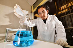 Chemical technologist Harry Pratt synthesizes a copper-based ionic liquid.