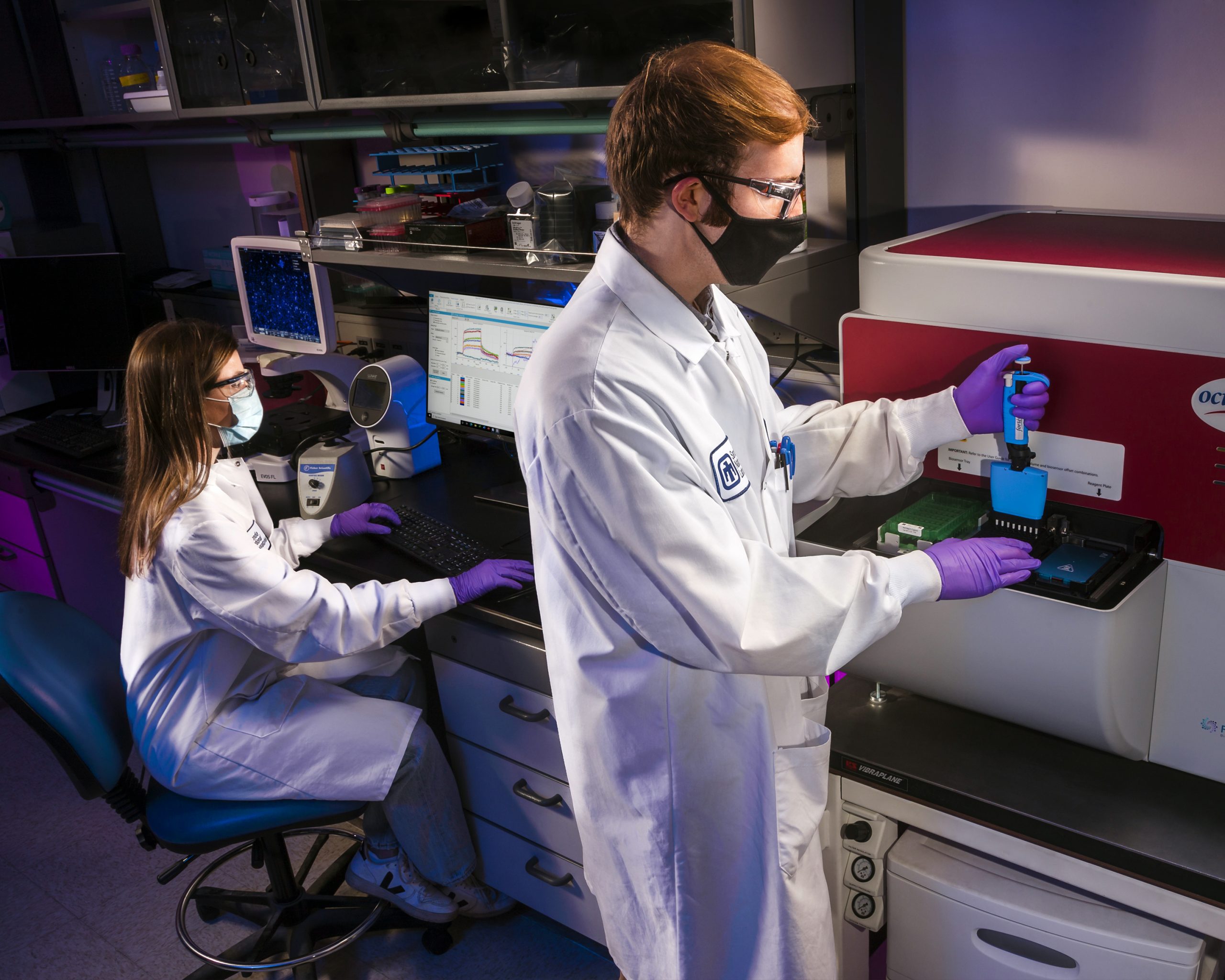 Christine Thatcher, left, and Peter McIlroy are members of the nanobody research team at Sandia National Laboratories. With a rich history of biodefense research, Sandia helps protect the nation and the world from threats presented by bioterrorism and naturally occurring diseases.