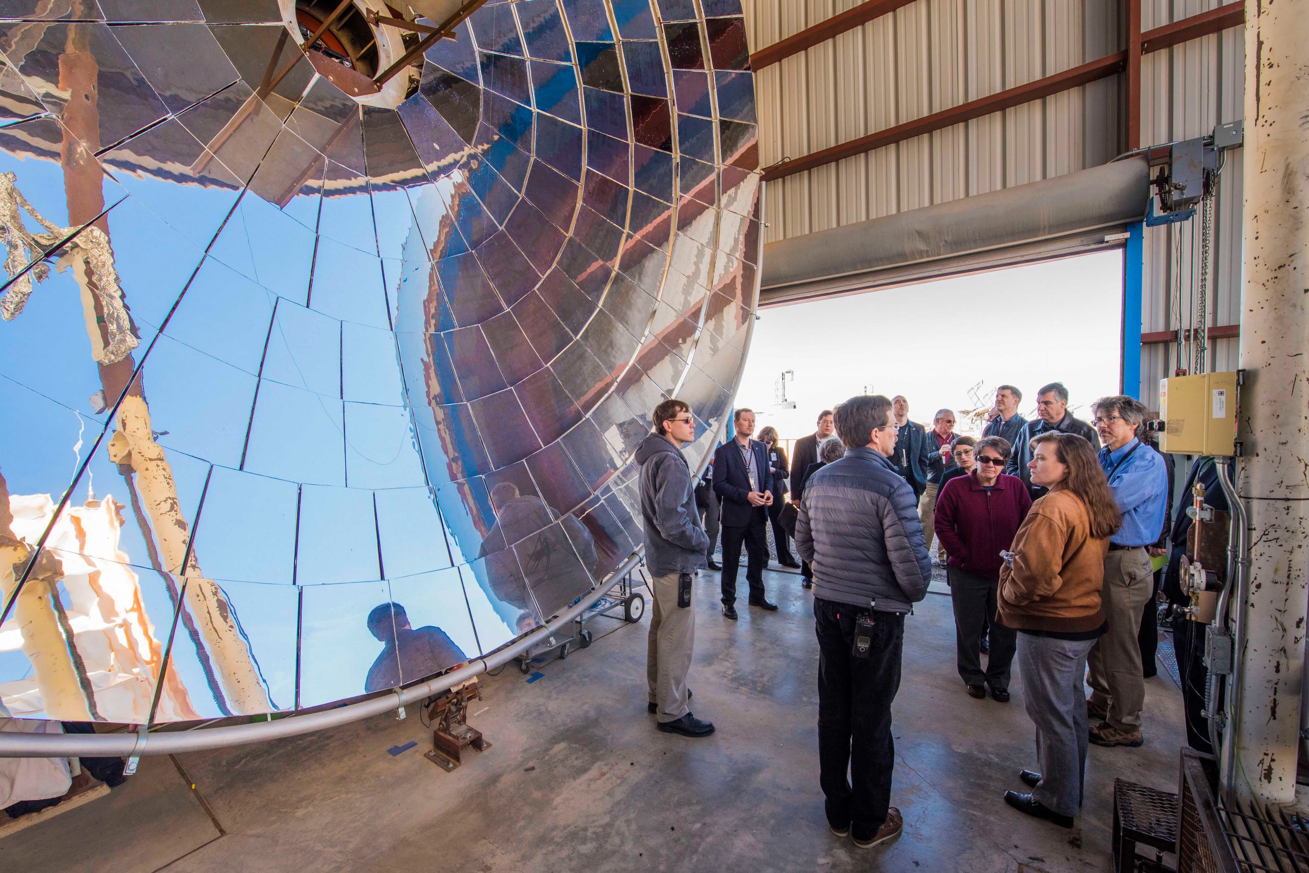 DOE Oppenheimer Science and Energy Leadership Program group explores Sandia's National Solar Thermal Test Facility during a site visit in February.