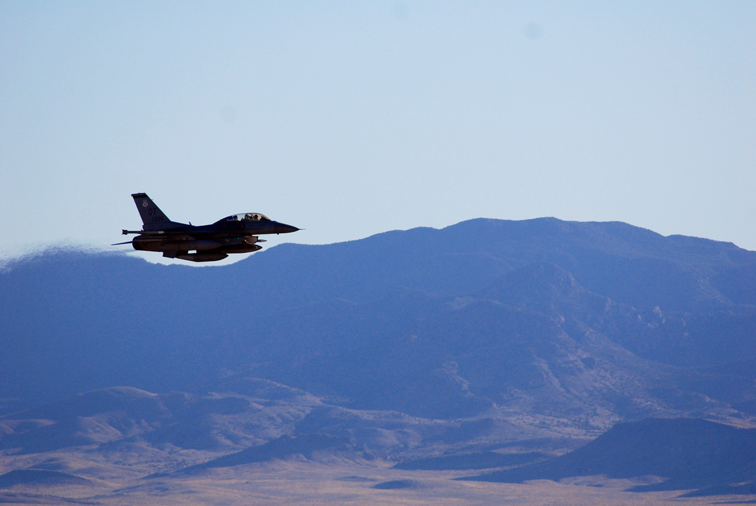 An F-16C makes a pass over Nevada’s Tonopah Test Range after a March test of a mock nuclear weapon as part of a Sandia National Laboratories life extension program for the B61-12. Teams will spend months analyzing the data gathered from the test.