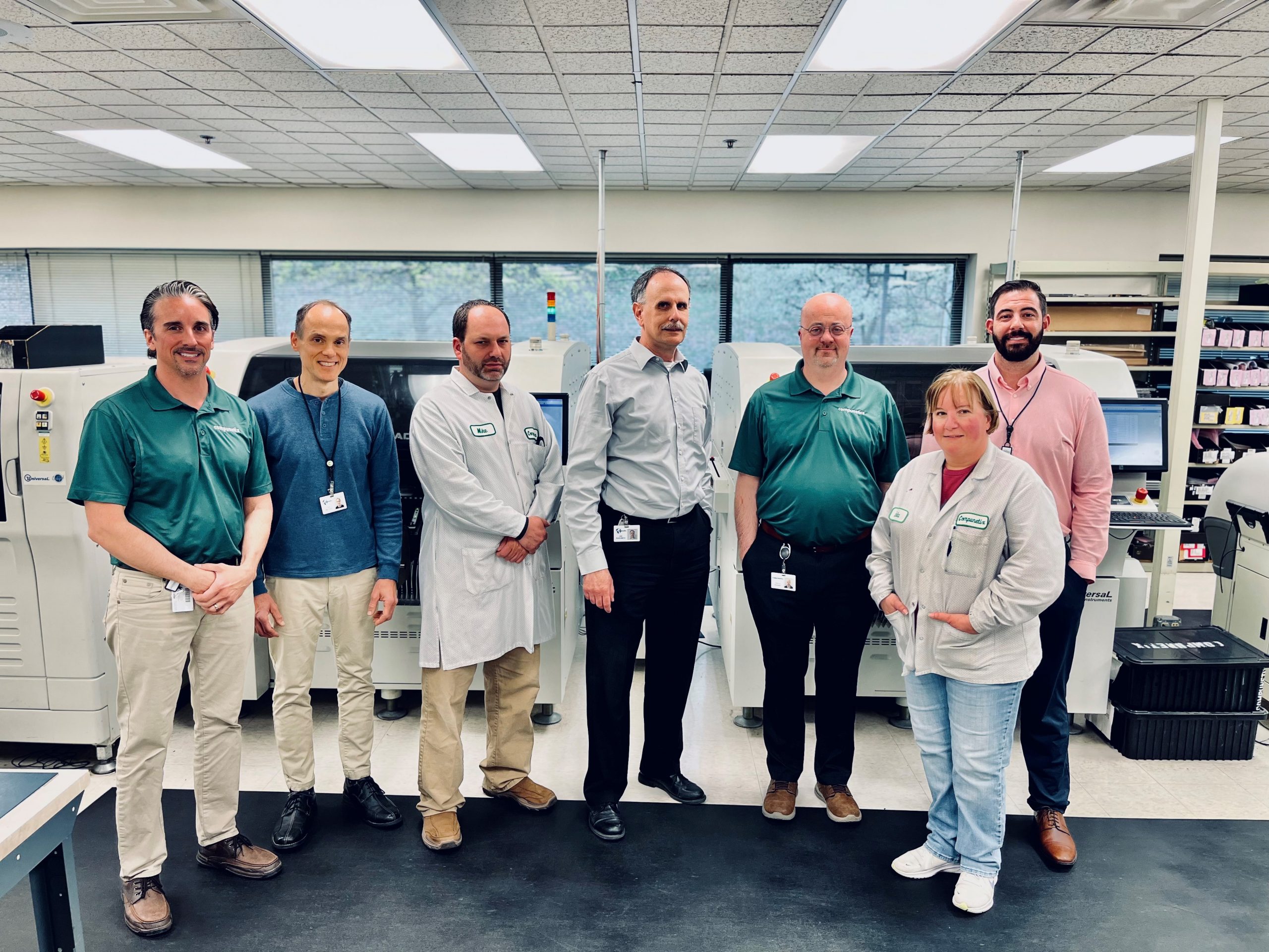 The Compunetics team includes Sam Bain, left, Joe Nativio, Mike Pilyih, Joe Kasunich, Chicco Vigano, Erika Choltko, James Tripp. Compunetics is participating in Sandia National Laboratories' Mentor-Protégé program.