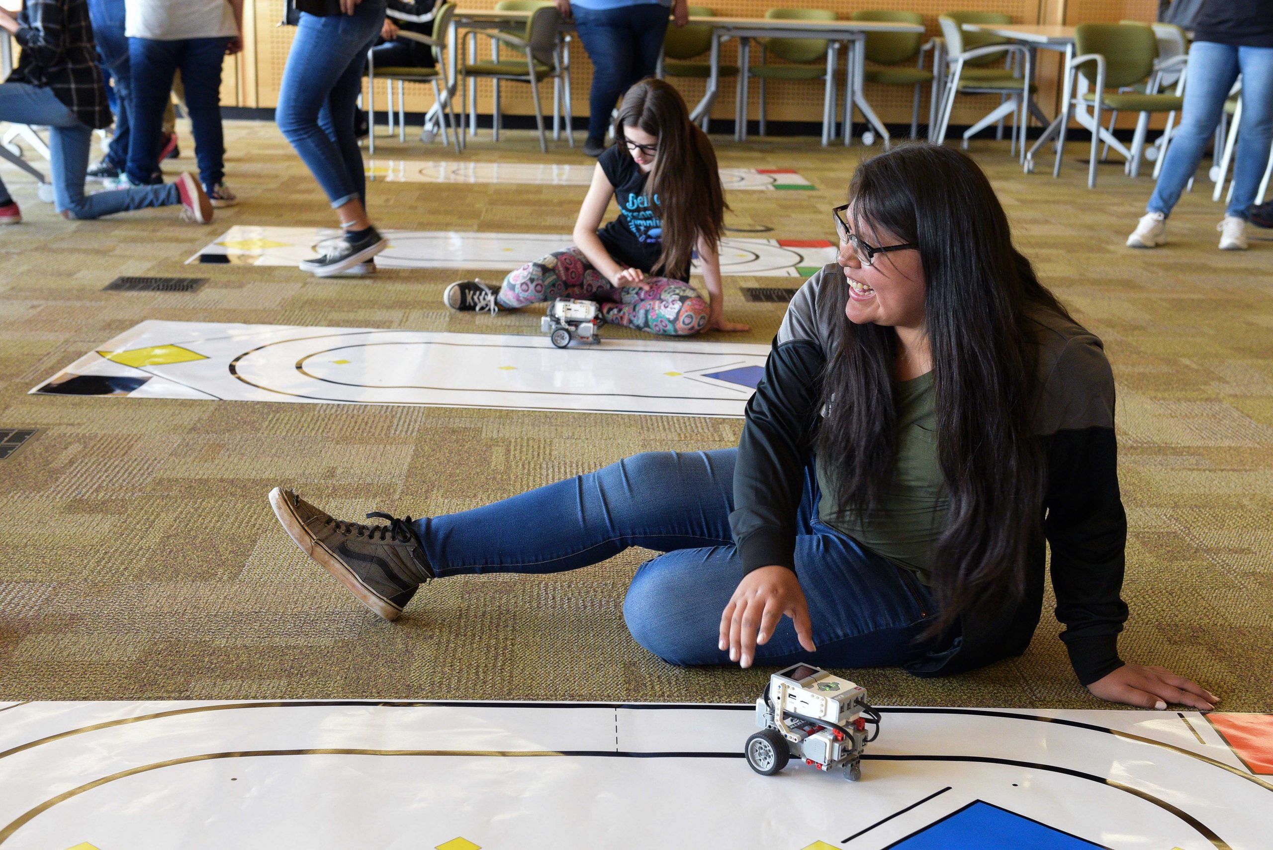 Students took to the track to launch fuel cell cars they constructed. Volunteers from Sandia National Laboratories also taught Lego robotics and cyber and information technology classes.