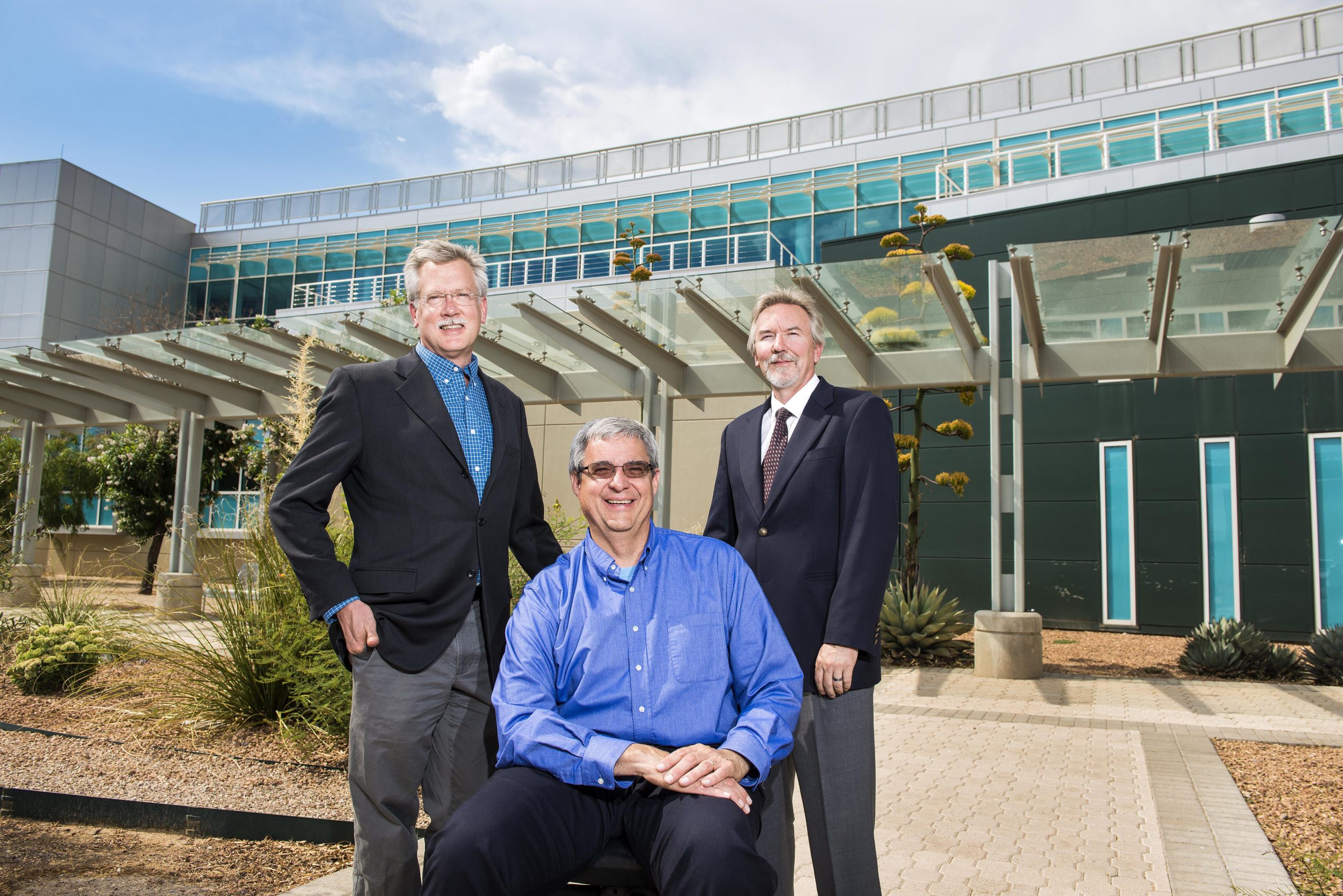 Newly appointed Sandia Fellows Jerry Simmons, left, Ed Cole, middle, and John Rowe gather outside Sandia's Joint Computational Engineering Laboratory.
