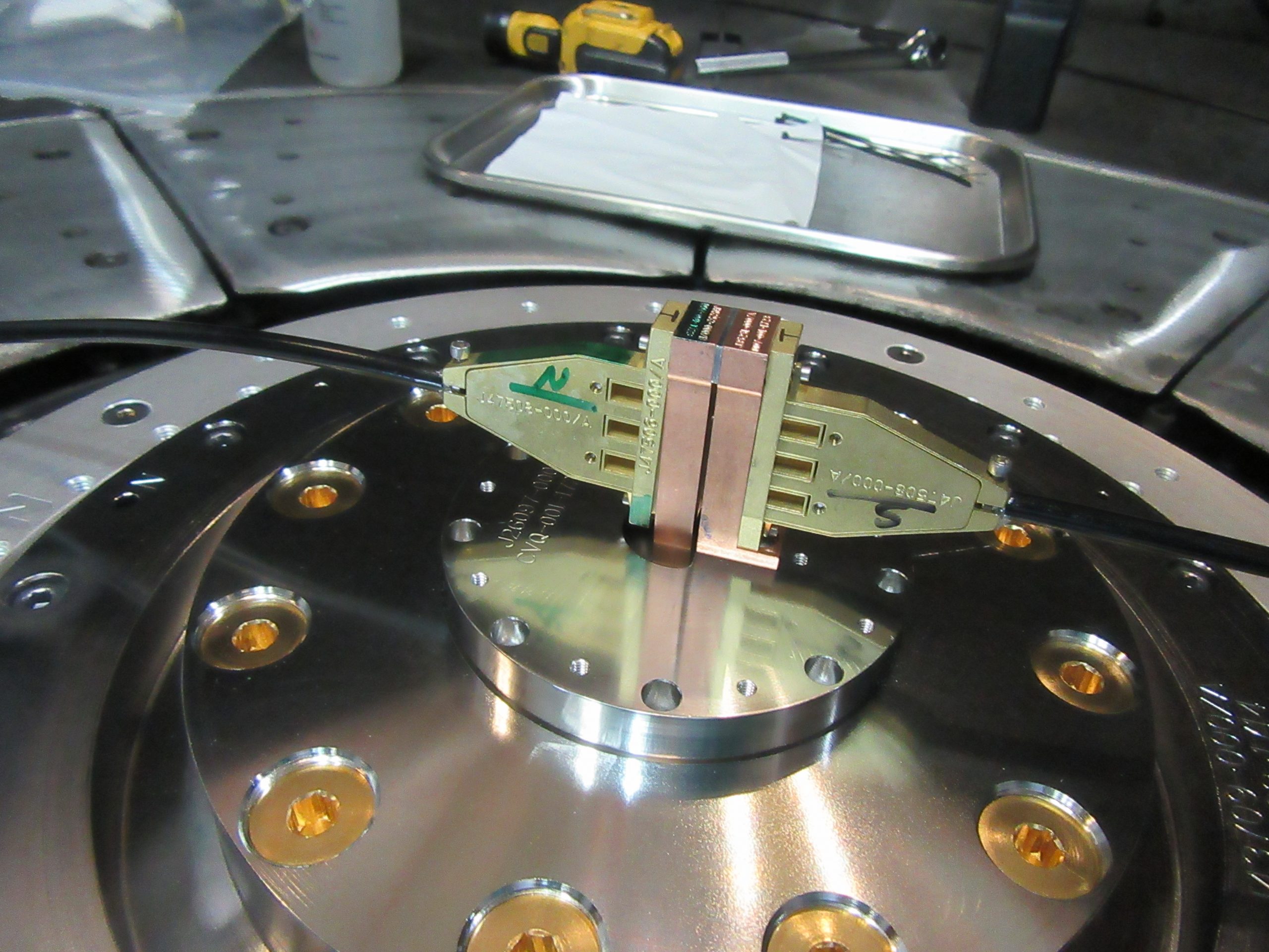 The complete target assembly inside Sandia National Laboratories' Z machine for the high-pressure materials experiments coordinated with researchers at Lawrence Livermore National Laboratory. The samples are covered by probes.