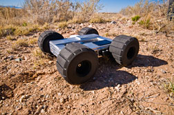 The four-wheeled hopper robots will navigate autonomously by wheel and jump — with one mighty leg — onto or over obstacles of more than 25 feet.