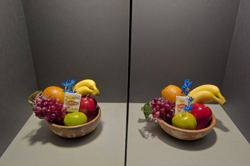 In the test setup, similar bowls of fruit were placed in a lightbox with a divider in the middle. In this photo, the bowl on one side was illuminated by a diode laser light and the other was lit by a standard incandescent bulb. The aesthetic quality of diode laser lighting