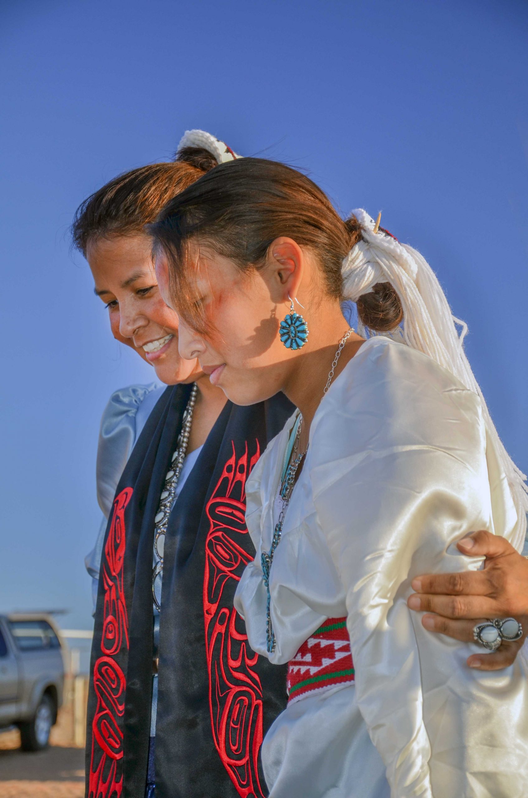 Sandia National Laboratories diversity workforce specialist Marie Capitan with her daughter during the Kinaalda ceremony, a celebration of womanhood in the Navajo tradition.