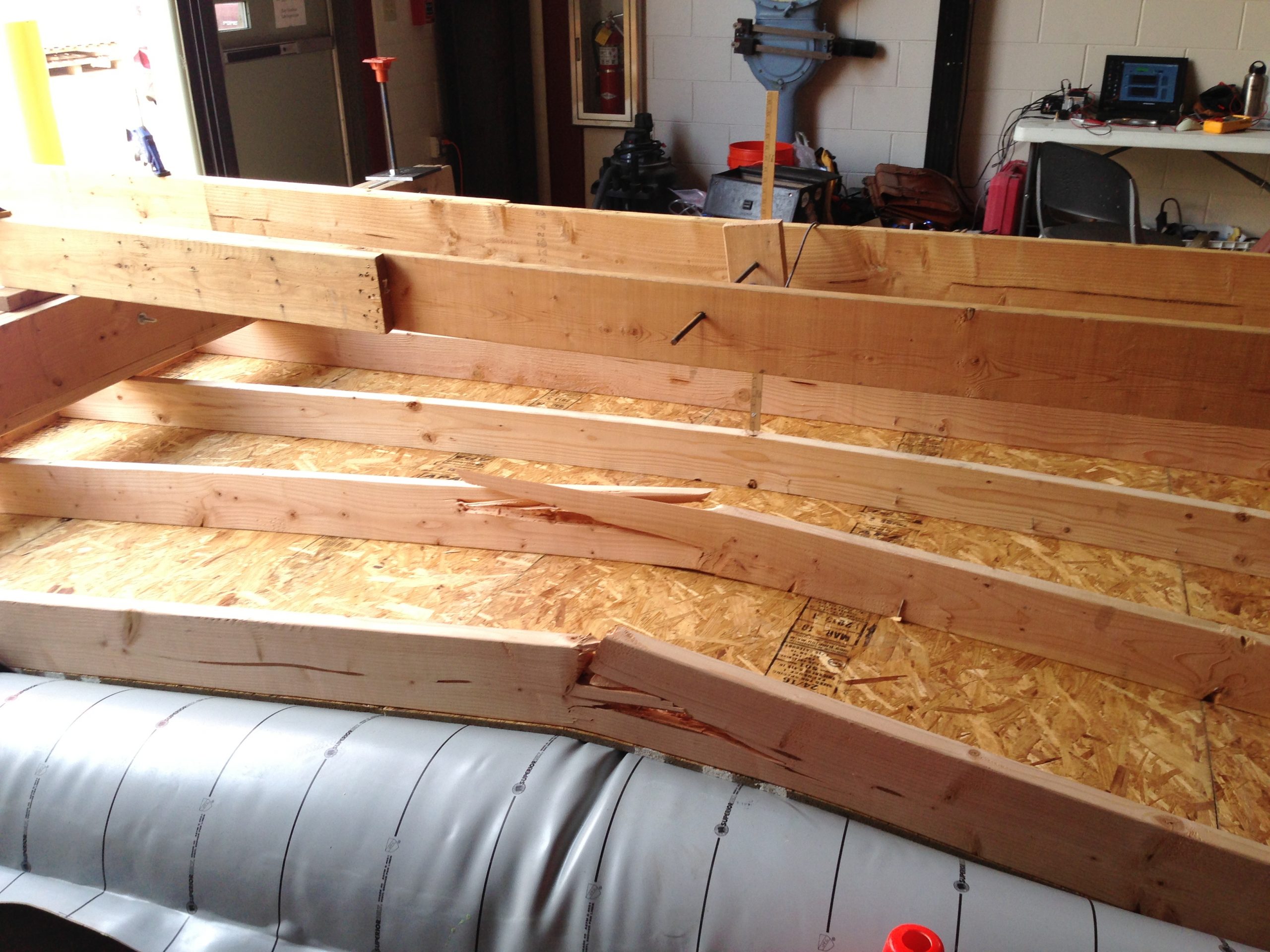 In a University of New Mexico lab, roofs were built and stressed to the breaking point to show the solar permitting community how strong they are. The tests were done by Sandia National Laboratories in partnership with UNM.