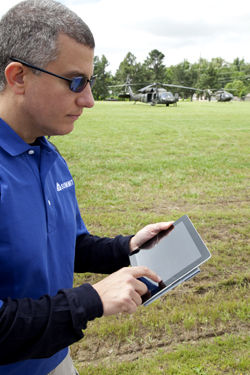 Sandia’s Chuck John uses the SUMMIT iPad app to visualize calculated building damage during NLE 11 exercise conducted in Jonesboro, Arkansas.