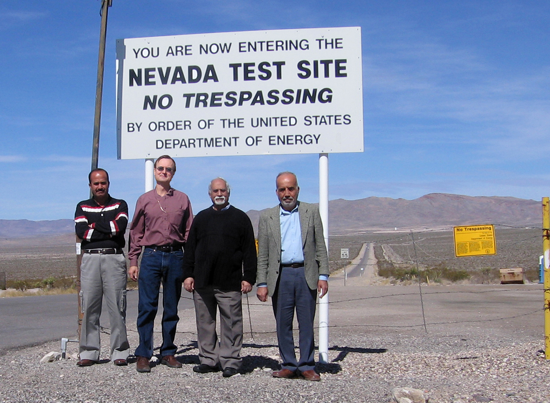 Iraqi government officials have toured two operating radioactive waste disposal facilities in locations with a climatic and geohydrologic conditions similar to those in Iraq. Here John Cochran (second from left) leads a tour of the Nevada Test Site.<br />
Download 300dpi 1.2MB JPEG image (Media are welcome to download/publish this image with related news stories.)