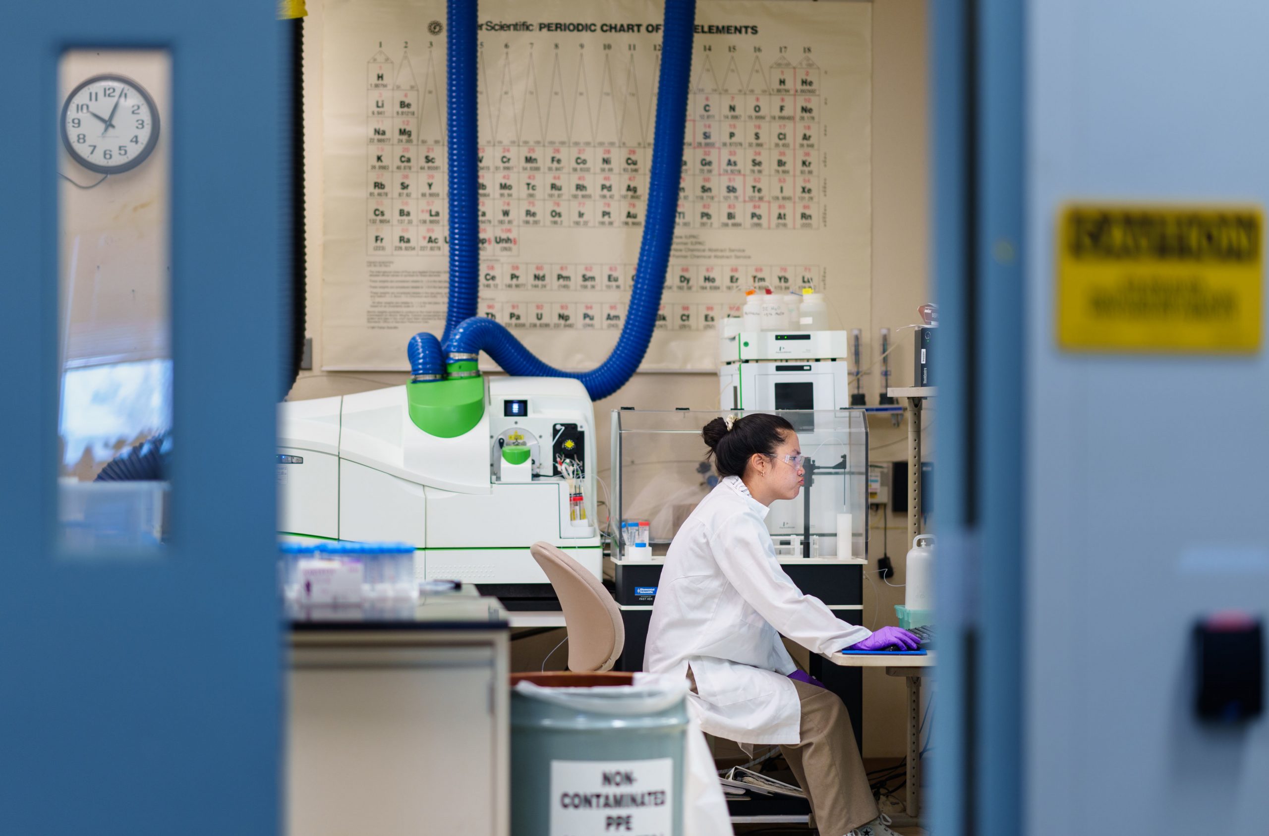 Sandia National Laboratories intern Kadie Marie Mei Sanchez works on a mass spectrometer used for quantifying the concentration of metals, such as the rare-earth elements separated by the tailored MOFs.