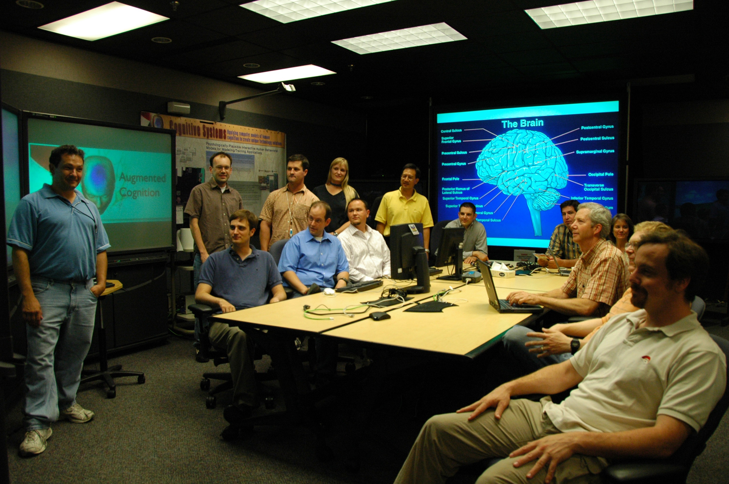COGNITION TEAM AT WORK (Left to right)<br />
Steve Verzi, Justin Basilico, Charlie Gieseler, Chris Davis (2nd row) Jon Whetzel, Russel Waymire, Ann Speed, Patrick Xavier, Zach Benz (right to back) Matt Glickman, Fred Rothganger, Brian Clark, Wendy Shanefelt, Brian Titu. (Photo by Tiana Chavez)