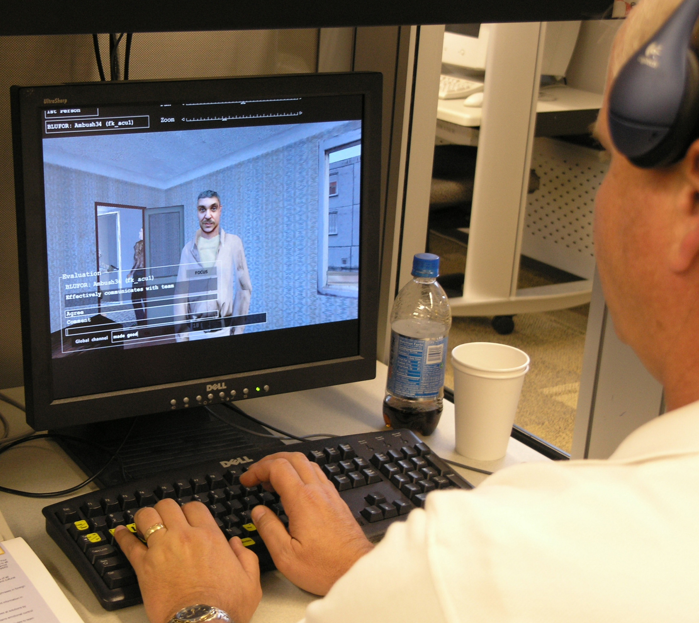 A user tests the new interpersonal skill building and cross-cultural awareness videogame technology Sandia researcher Elaine Raybourn and her team enhanced and recently turned over to DARPA.<br />
Download 300dpi 2.6MB JPEG image (Media are welcome to download/publish this image with related news stories.)