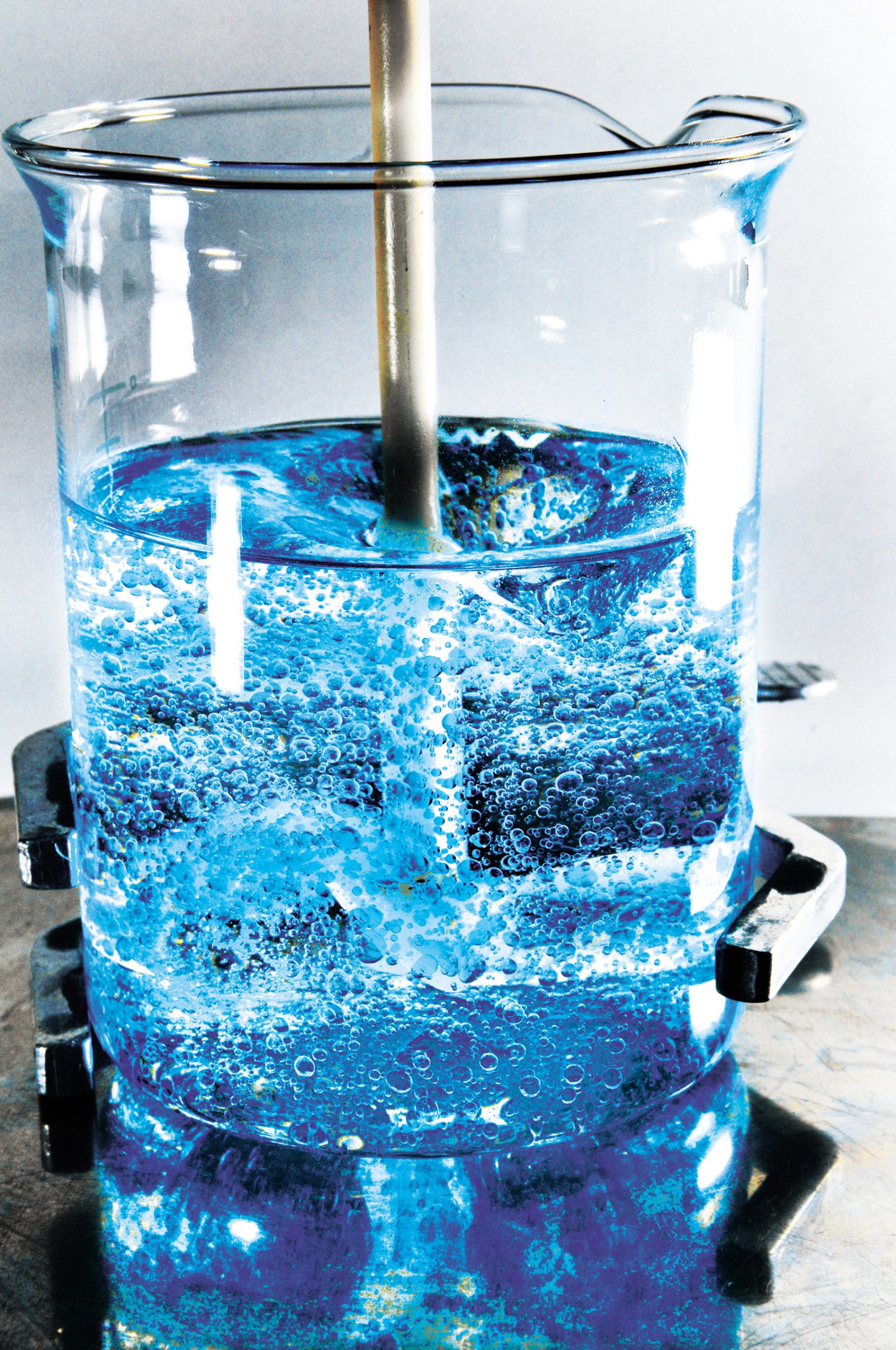 Stirred, not shaken. One frequently used microencapsulation process involves stirring an aqueous core and an organic solvent containing a dissolved polymer shell material into an emulsion.(Photo by Randy Montoya)