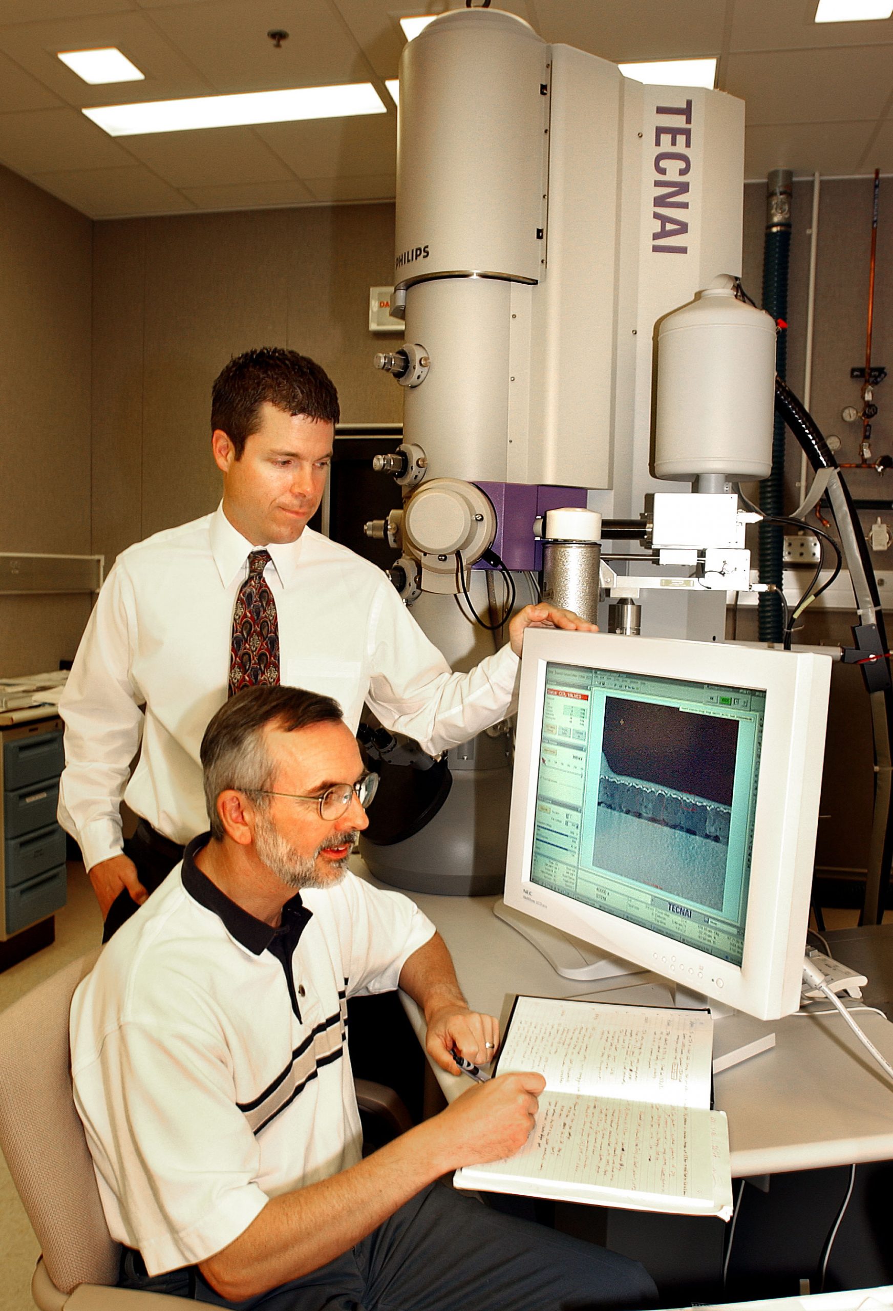 Sandia National Laboratories scientists Paul Kotula and Michael Keenan were developers of the R&D 100 Award-winning Component Analysis Software (Compass) that automatically analyzes the chemistry of a micro- or macrostructure. (Photo by Randy Montoya)<br />
Download 300dpi JPEG image, ‘RD100kotula.jpg’, 916K (Media are welcome to download/publish this image with related news stories.