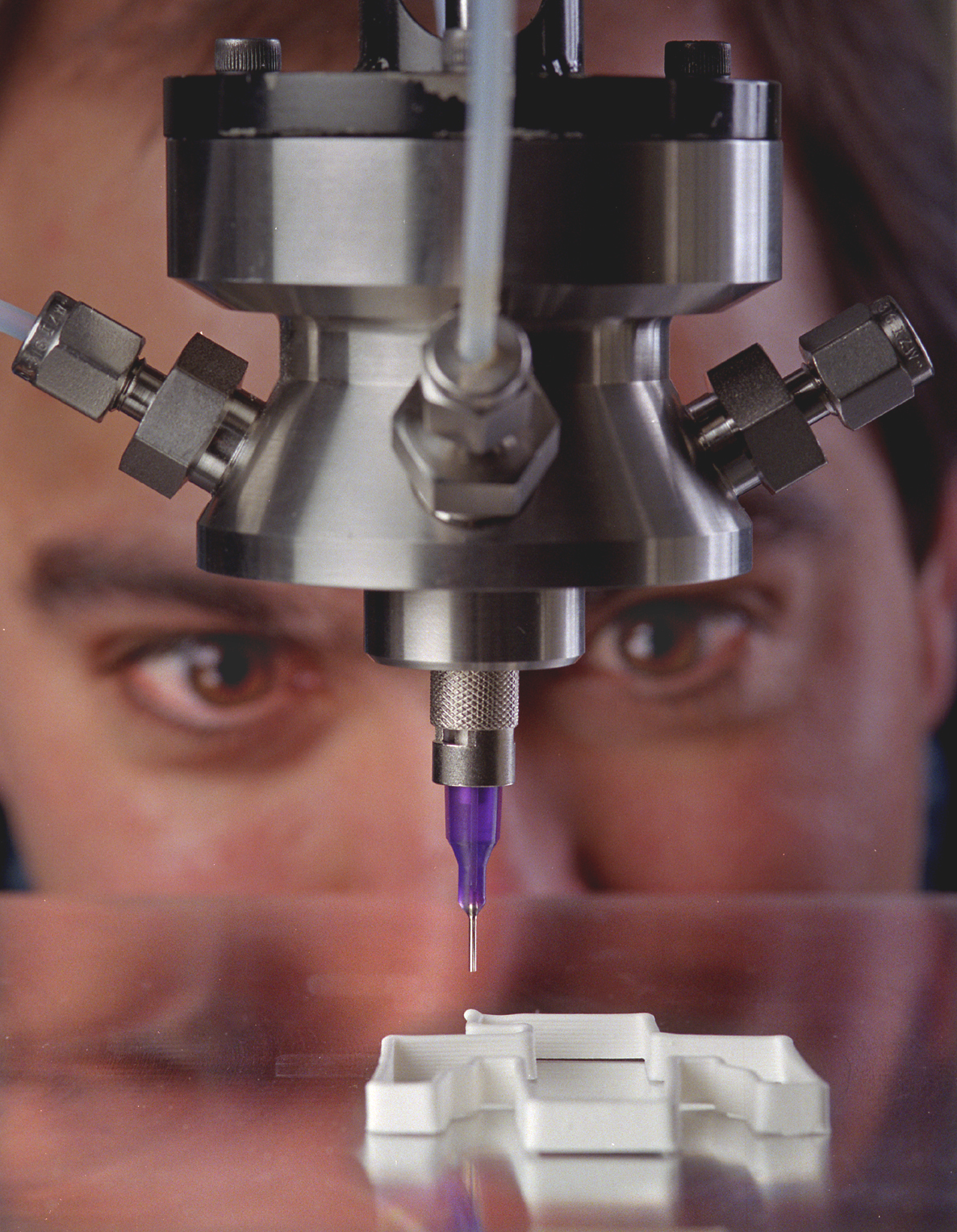 Sandia National Laboratories engineer Joe Cesarano has developed a new way of fabricating ceramics, called robocasting, that requires no molds or machining.