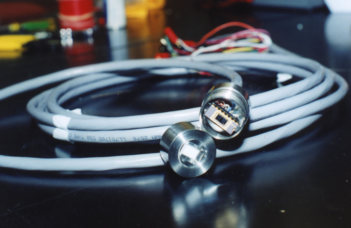 CLOSEUP of sensor housing and cable.