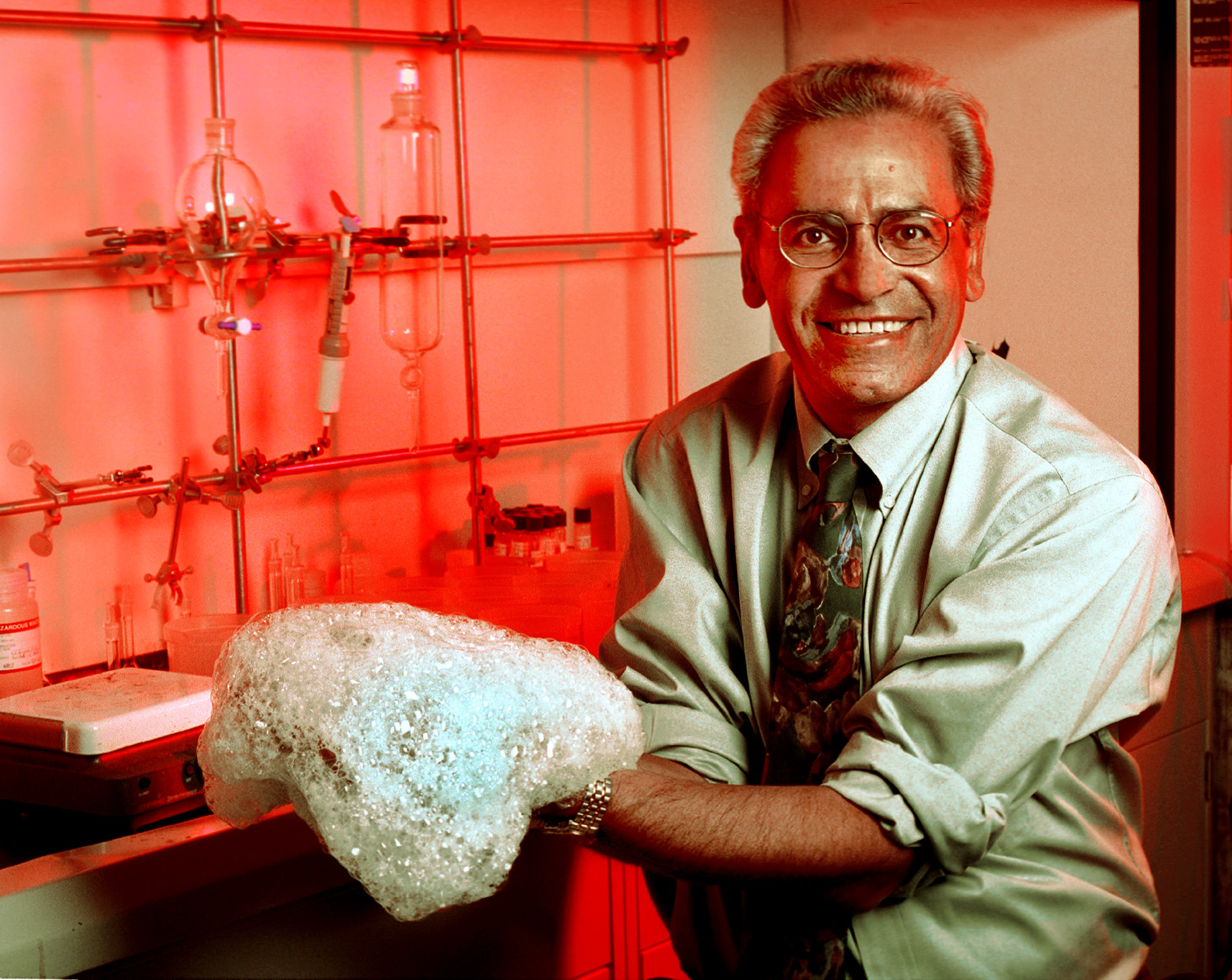 Co-developer Maher Tadros displays Sandia's non-toxic foam for neutralizing chemical and biological agents. (Photo by Randy Montoya)