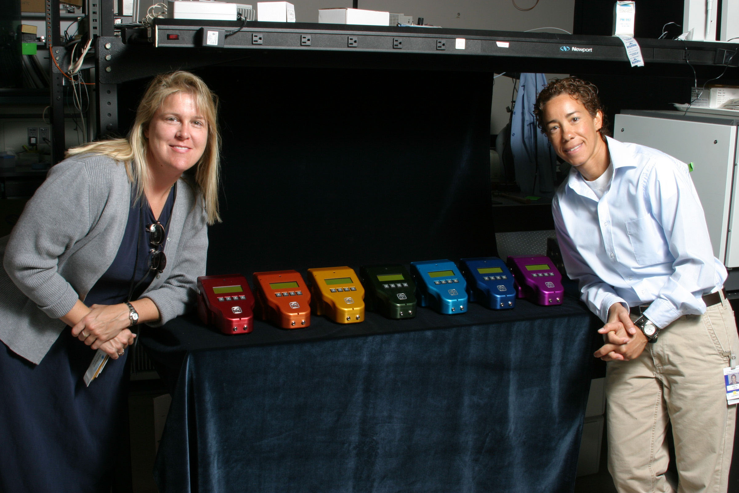 Sandia chemist Victoria Vandernoot and technologist Evelyn Cruz are two of the researchers who work on the µChemLab™ systems. The gas-phase systems can be used for the detection of chemical warfare agents and a selection of toxic industrial chemicals, explosives, and organic solvents. (Photo by Bud Pelletier)