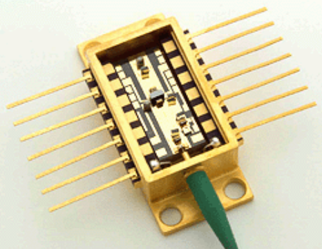 Alignment structures, less than a 10th of an inch in size in this optical module, make use of Sandia National Laboratories' expertise in the LIGA microfabrication process. This photonic subsystem, by Sandia's licensing partner Axsun Technologies of Billerica, Mass., sits on an electronic assembly that occupies about 60 percent of the area of a business card (2.5 inches long x 1.7 inches wide).