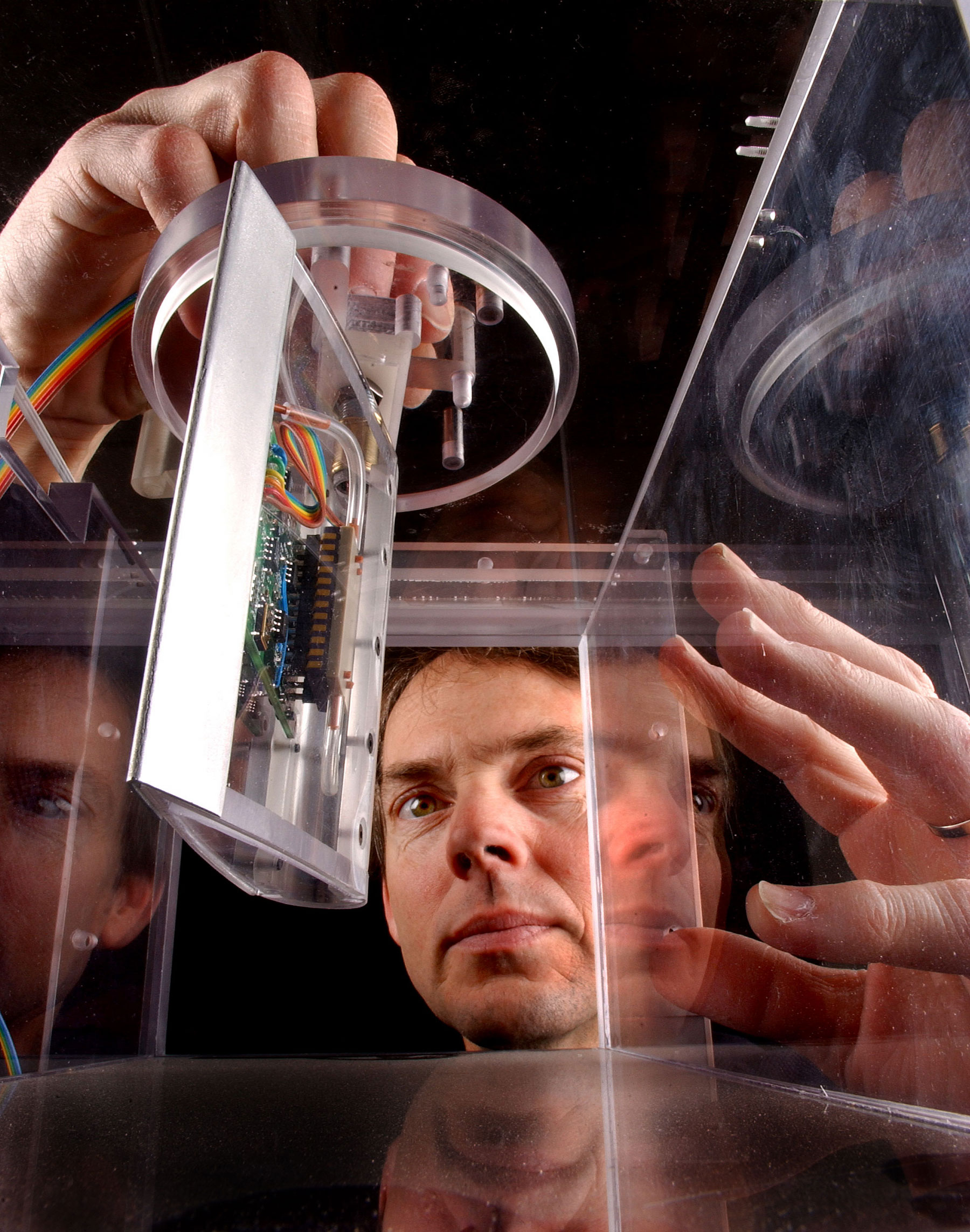 andia researchers Doug Adkins observes the wind tunnel performance of SnifferSTAR, a device intended to fly on drones and immediately detect airborne blister agents and nerve gases. (Photo by Randy Montoya)