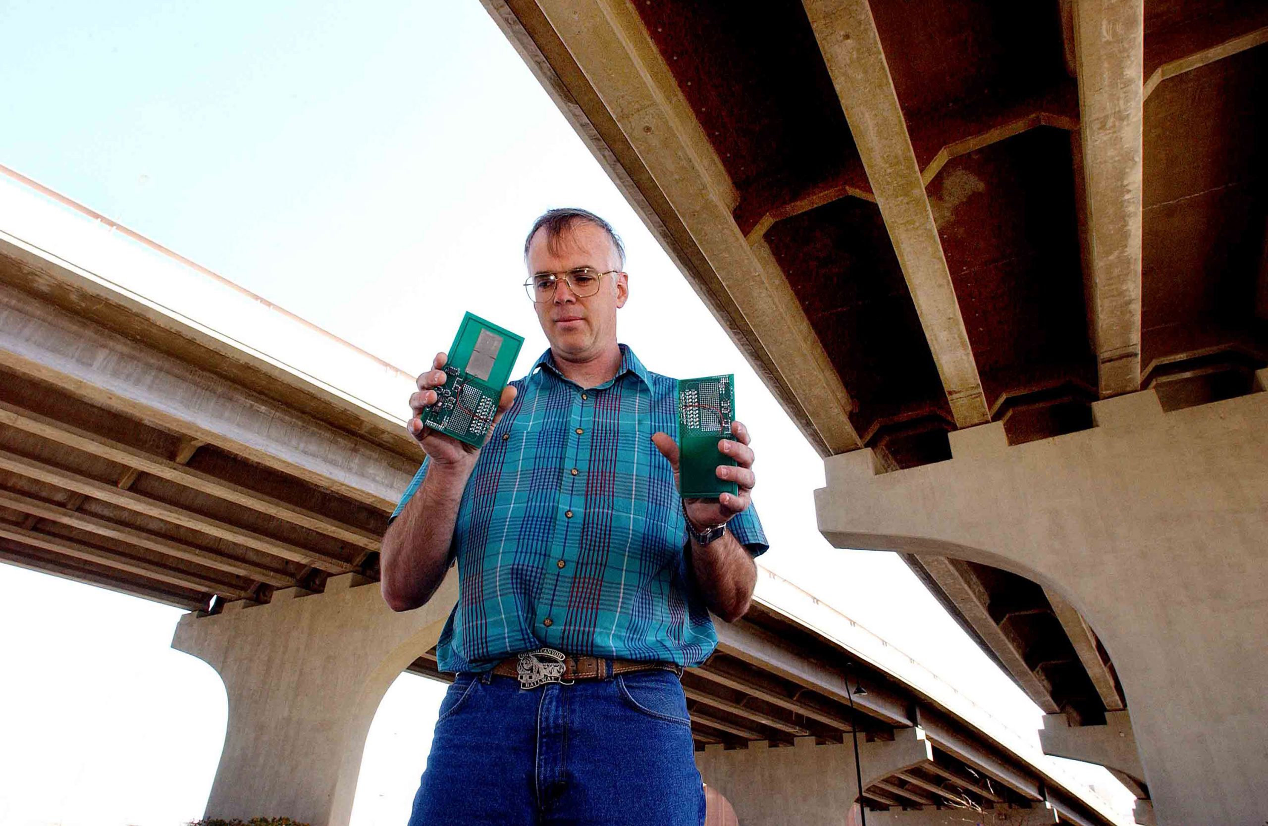 A team of Sandia National Laboratories researchers led by Kent Pfeifer has designed and demonstrated the feasibility of a wireless, battery-free sensor and data-storage device powered by the subtle vibrations of structures, such as buildings and bridges. (Photo by Randy Montoya)<br />
Download 300dpi JPEG image, ‘vibesensor.jpg’, 880K (Media are welcome to download/publish this image with related news stories.)