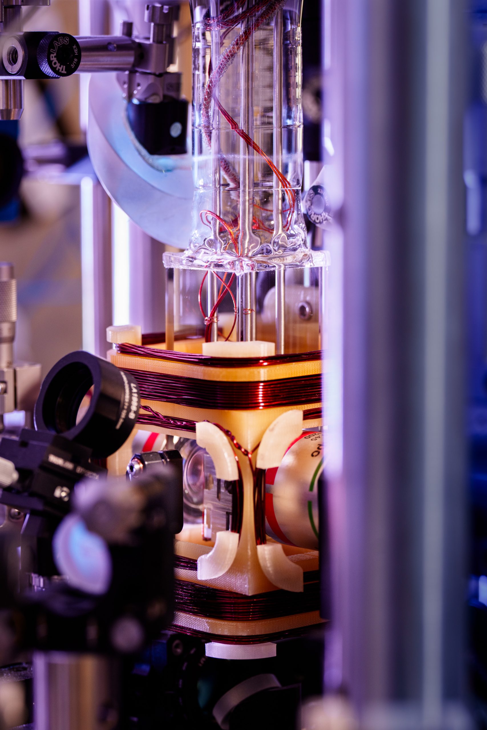 Objective lenses on either side of the vacuum chamber are used to focus laser light into single-atom traps at Sandia National Laboratories.