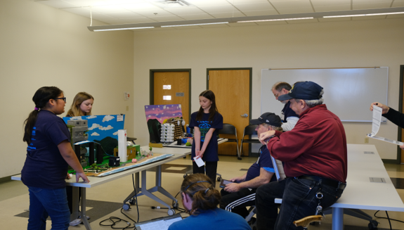 Students practice their presentation skills during the 2024 Future City Competition sponsored by Sandia National Laboratories.