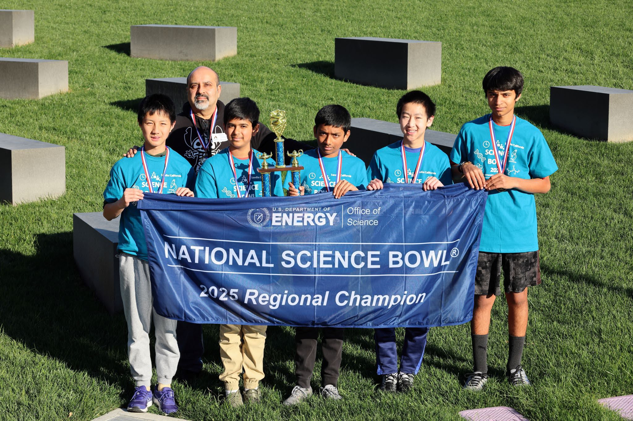 The 2025 California Regional Science Bowl Middle School competition winners from William Hopkins Middle School, from left to right: Andy Liu, coach Sachin Parekh, Avi Batra, Milan Nair, Lucas Jiang and Abhiraam Girish. 