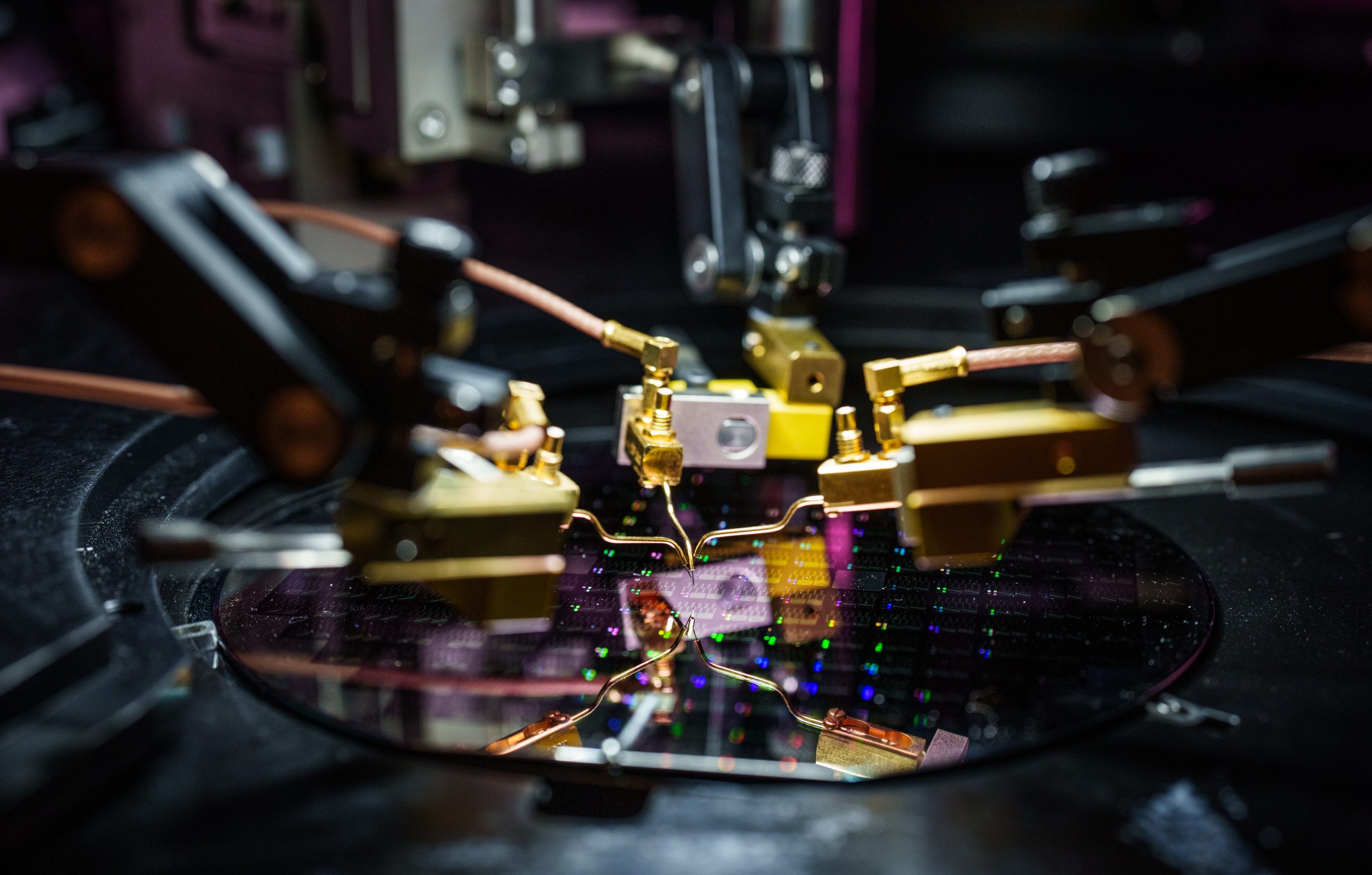 Sandia National Laboratories intern Jared Arzate remotely operates a device to test the effect of temperature on brain-inspired computing devices. 