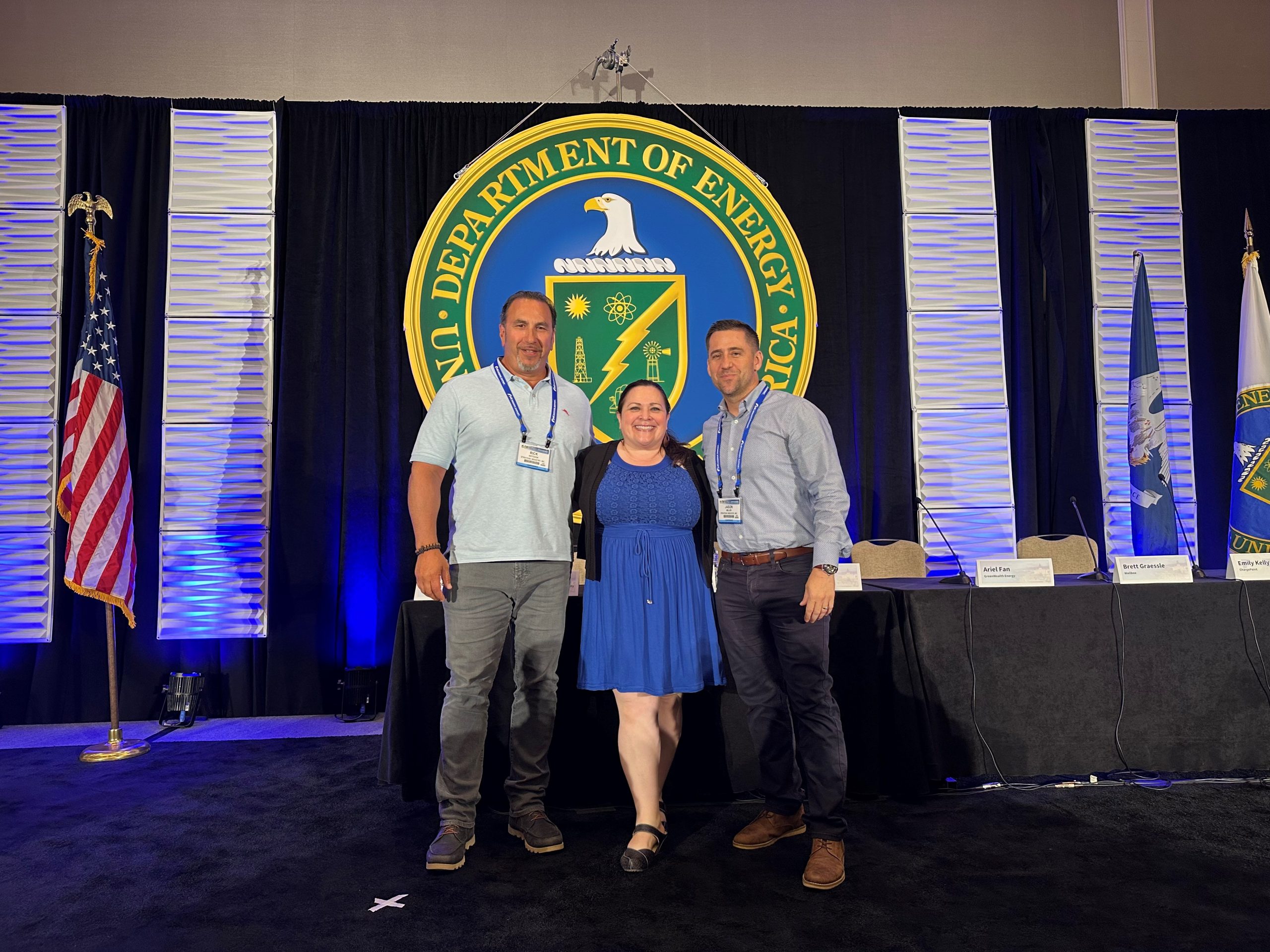 Rick Arteaga, left, and Jason Miller, right, of Strategic Industry Inc., join Sandia Mentor-Protégé Program Lead Royina Lopez at a Department of Energy Event as part of the Mentor-Protégé Program.<br />
<br />
