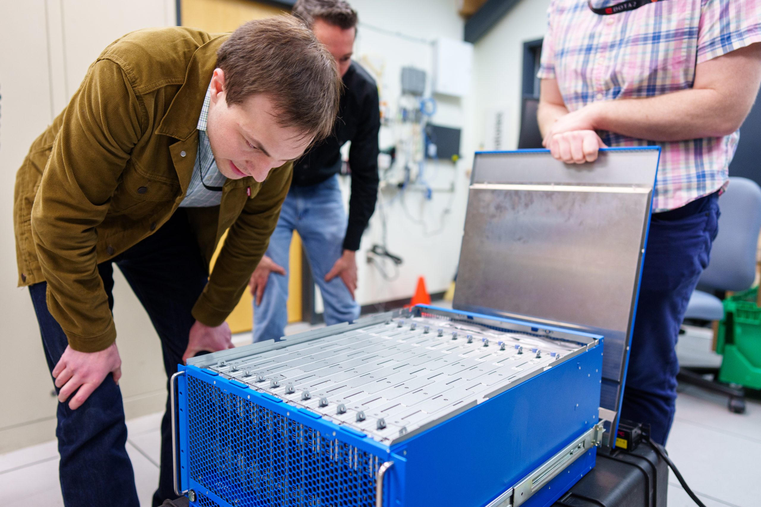 Brad Theilman, a computational neuroscientist at Sandia National Laboratories, helped discover that nature-inspired, neuromorphic computers, like the one shown here, are better at solving complex math problems than previously thought. The finding offers a potentially more energy-efficient way to run physics simulations used throughout the nuclear security enterprise.