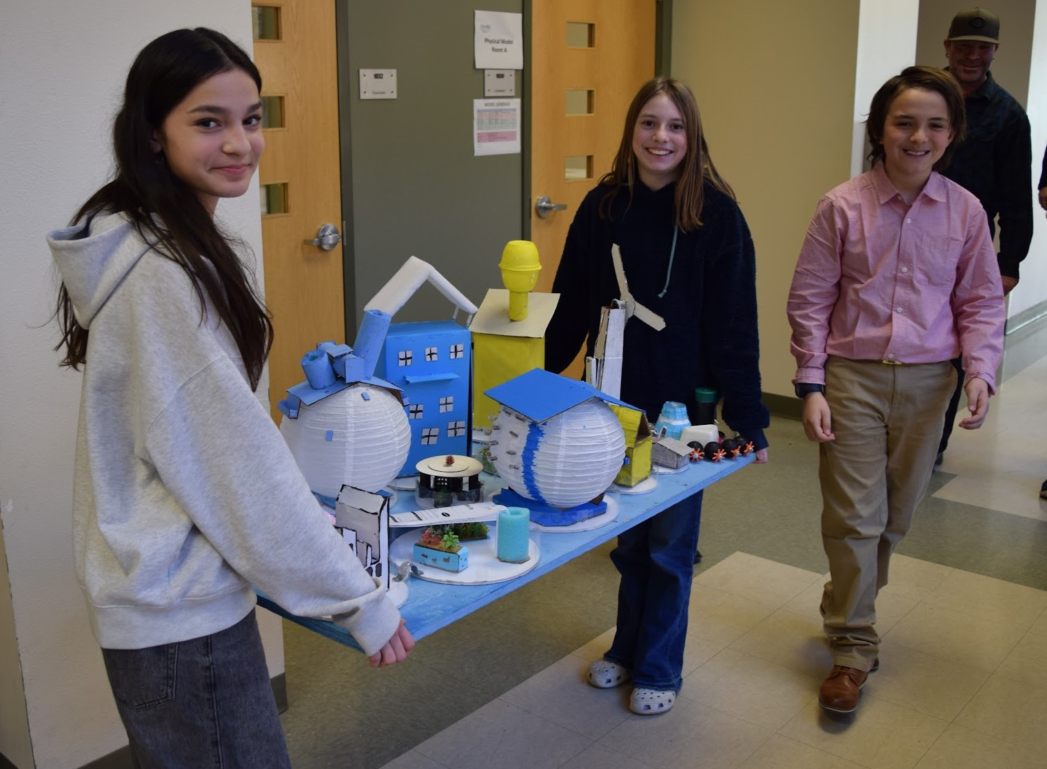 Students prepare to present their future city as part of the 2025 Future City Competition. 