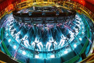 <strong>Sandia National Laboratories' Saturn accelerator during a shot in 2011. Since the recent refresh and redesign, it exhibits even less electricity-wasting arcing that looks like lightning, improving its reliability and performance.</strong> (Photo by Randy Montoya) Click on the thumbnail for a high-resolution image.