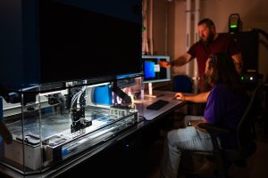 <strong>Staff at Sandia National Laboratories work to set up a new ultrasonic tool that will use artificial intelligence to inspect ceramics components used in nuclear deterrence applications, replacing a time-consuming manual method. </strong>(Photo by Craig Fritz) Click on the thumbnail for a high-resolution image.